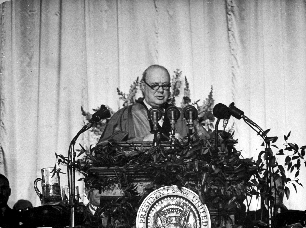 British Prime Minister Winston Churchill delivers a speech at Westminster College that addressed the Communist threat, and in which he uttered the now-famous phrase 'Iron Curtain,' Fulton, Mo., Mar. 5, 1946. (George Skadding—The LIFE Picture Collection/Getty)