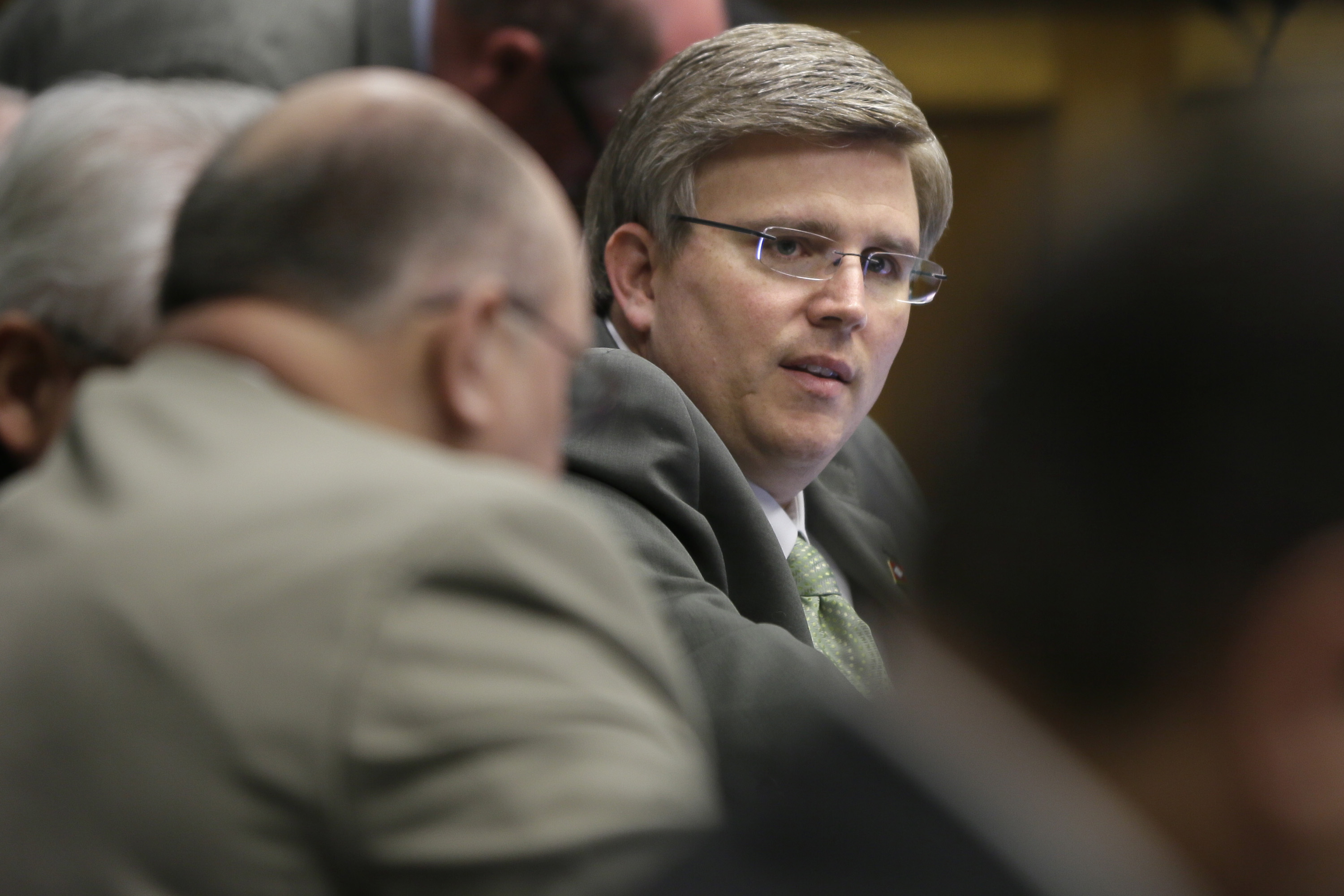 Rep. Justin T. Harris, R-West Fork, questions a witness during a meeting of the House Committee on Education at the Arkansas state Capitol in Little Rock, Ark. on Feb. 26, 2015.