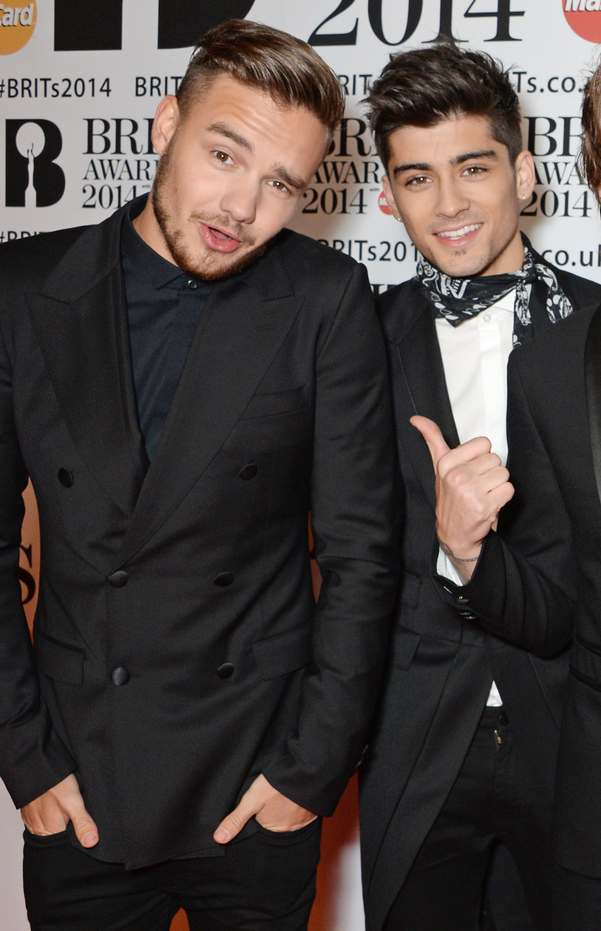 Liam Payne and Zayn Malik of One Direction attend The BRIT Awards 2014 at the 02 Arena on Feb. 19, 2014 in London.