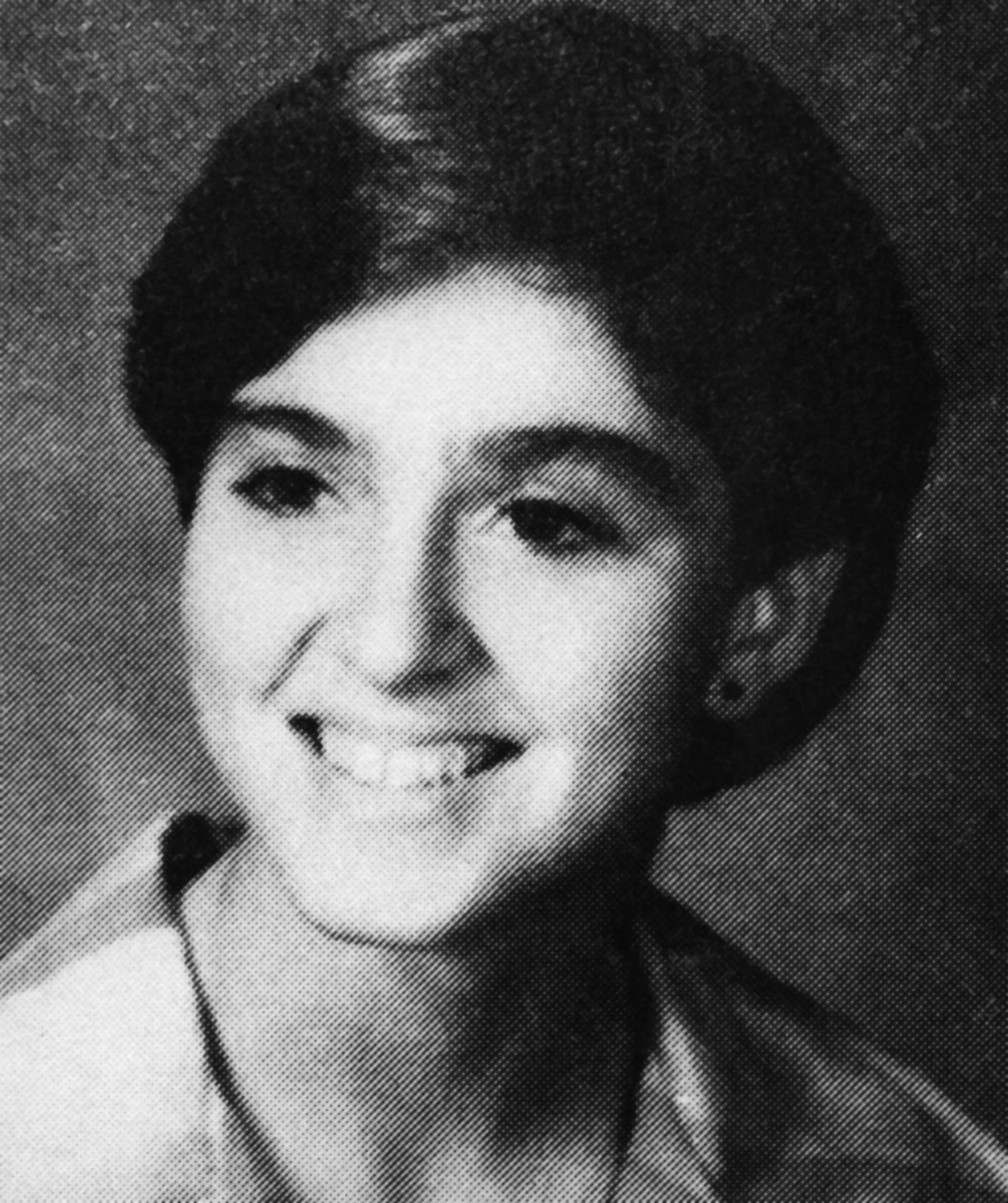 Madonna poses for her senior year book photo at Adams High School in 1976 in Rochester, Mich.
