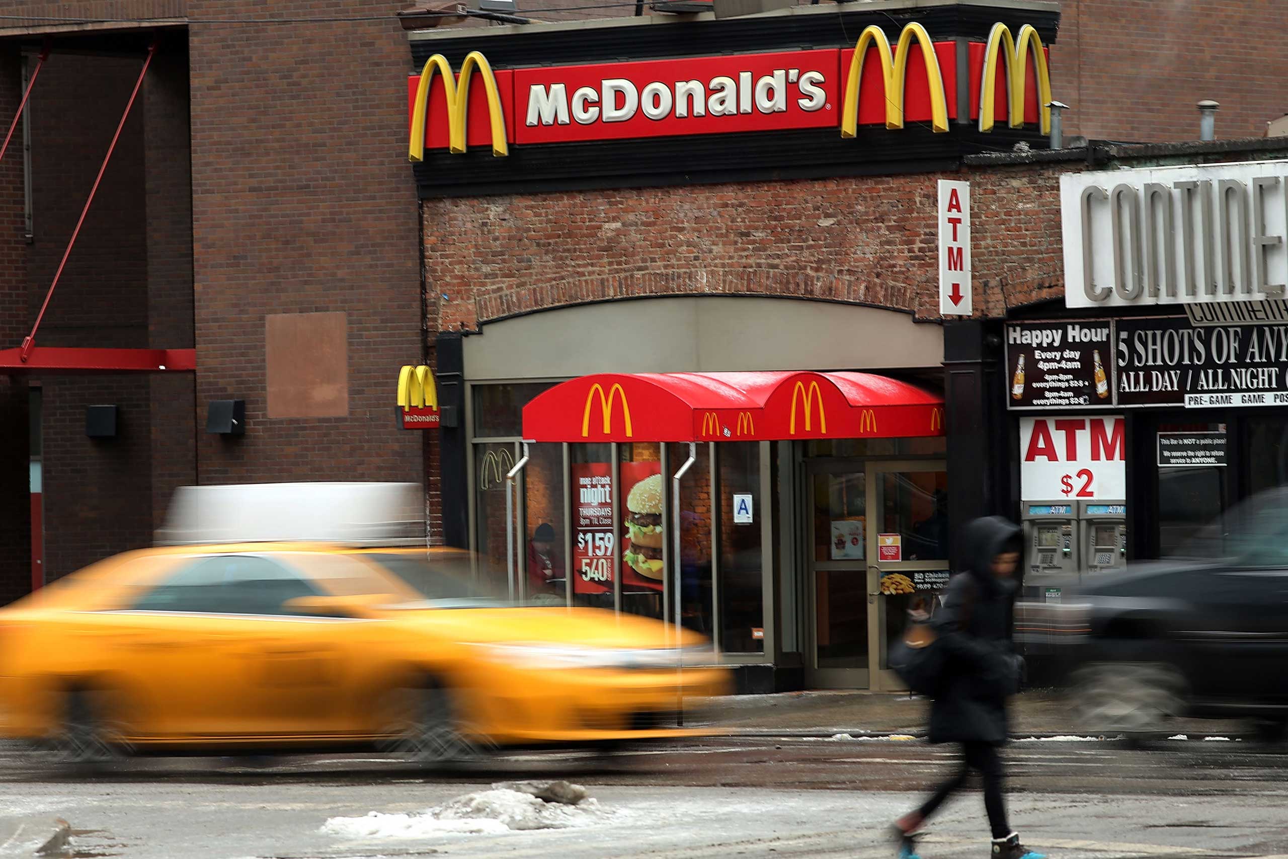 Cars move past a McDonald's in lower Manhattan on February 9, 2015 in New York City.