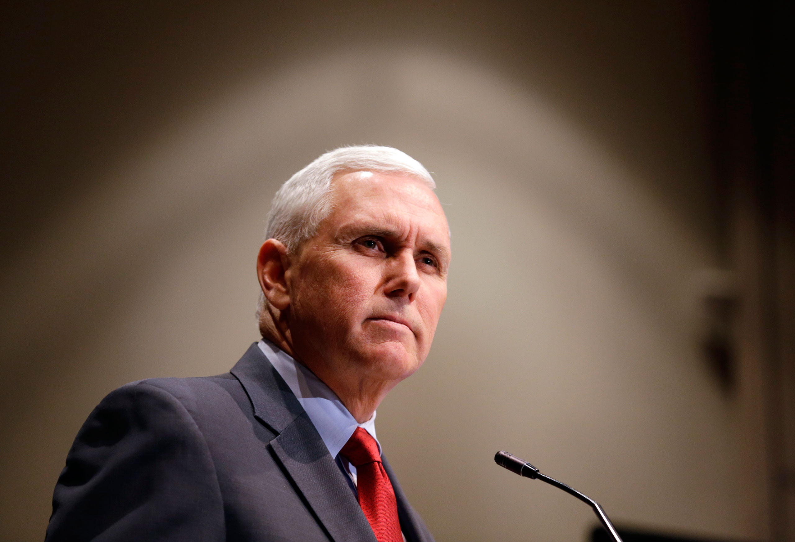 Indiana Gov. Mike Pence announces that the Centers for Medicaid and Medicare Services has approved the state's waiver request for the plan his administration calls HIP 2.0, during a speech in Indianapolis. (Michael Conroy—AP)