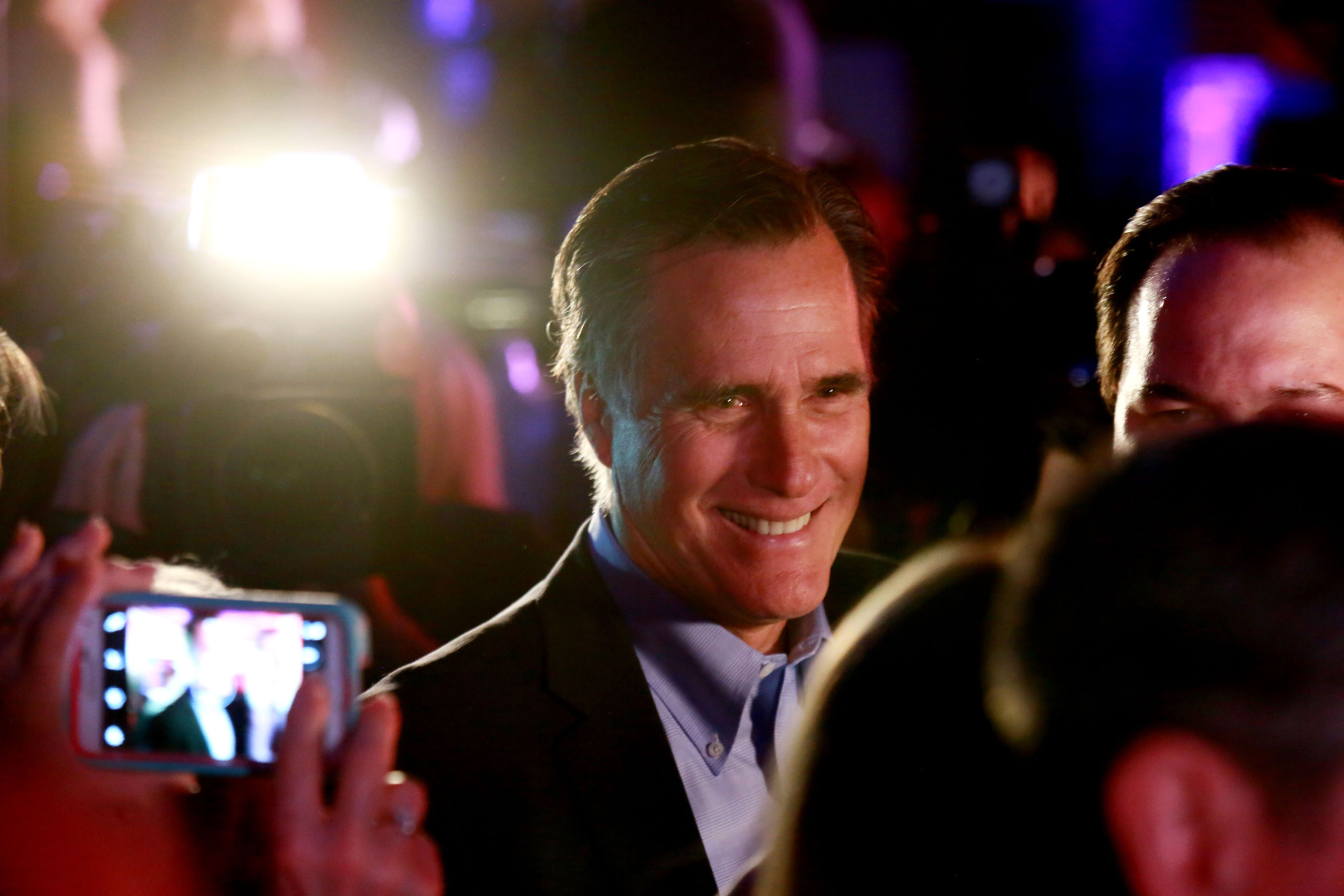 Mitt Romney is greeted by fellow Republicans at a dinner during the Republican National Committee's Annual Winter Meeting aboard the USS Midway on Jan. 16, 2015 in San Diego.