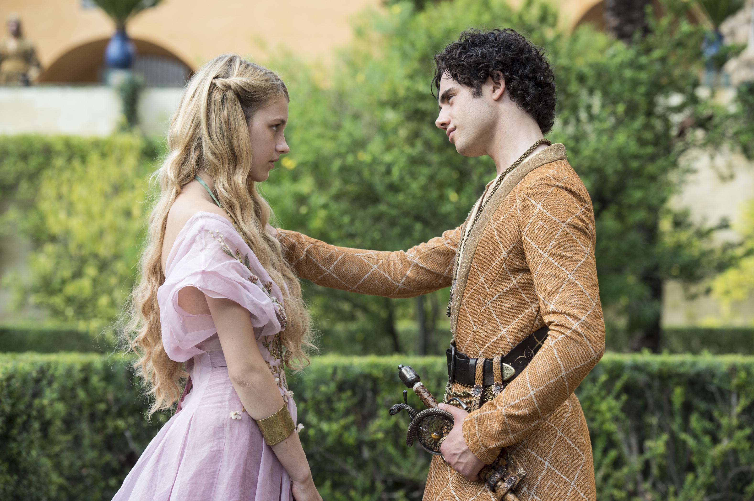 Myrcella (L), played by Nell Tiger Free, speaks with Trystane Martell (R), played by Toby Sebastian, in season 5 of HBO's "Game of Thrones."