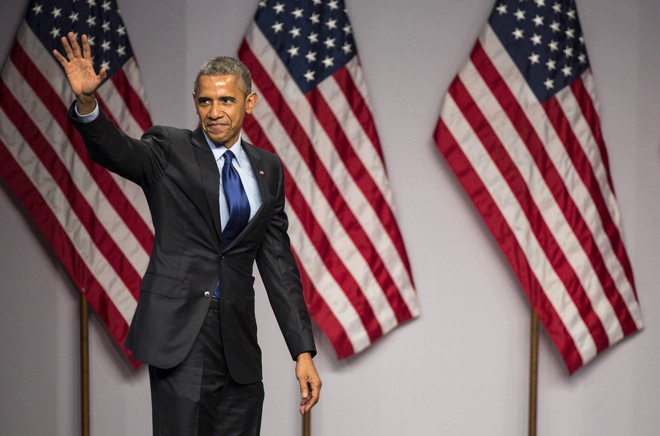 U.S. President Obama waves after speaking at the SelectUSA Investment Summit