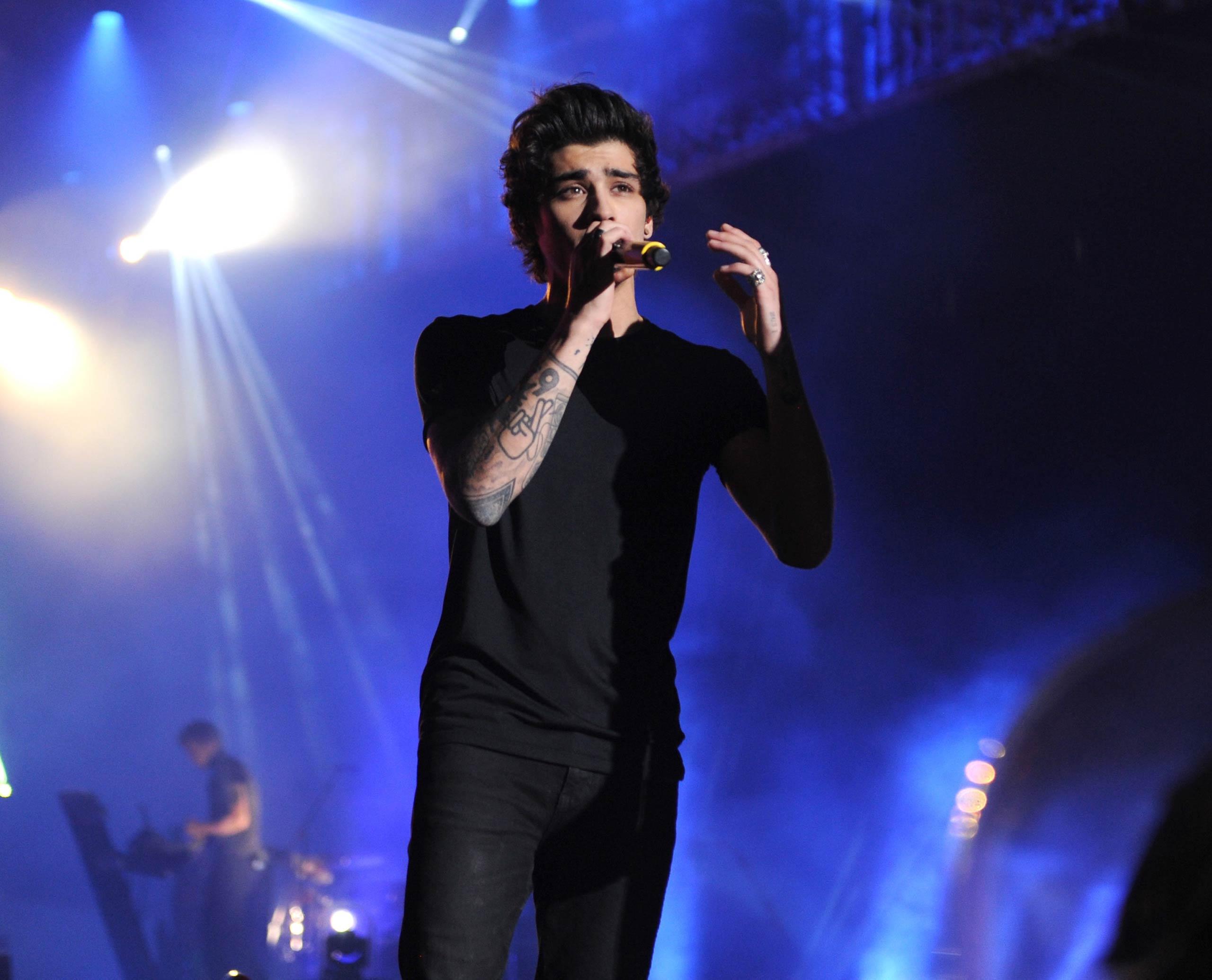 Zayn Malik of One Direction performs onstage during the  Where We Are  tour at Met Life Stadium on Aug. 4, 2014 in New York City.