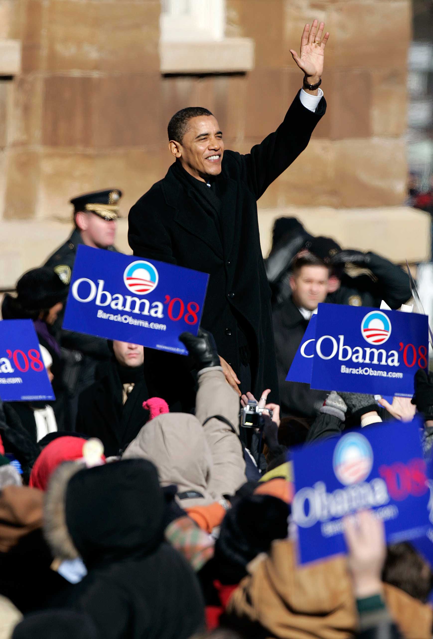 Illinois senator Barack Obama waves to the crowd before he a