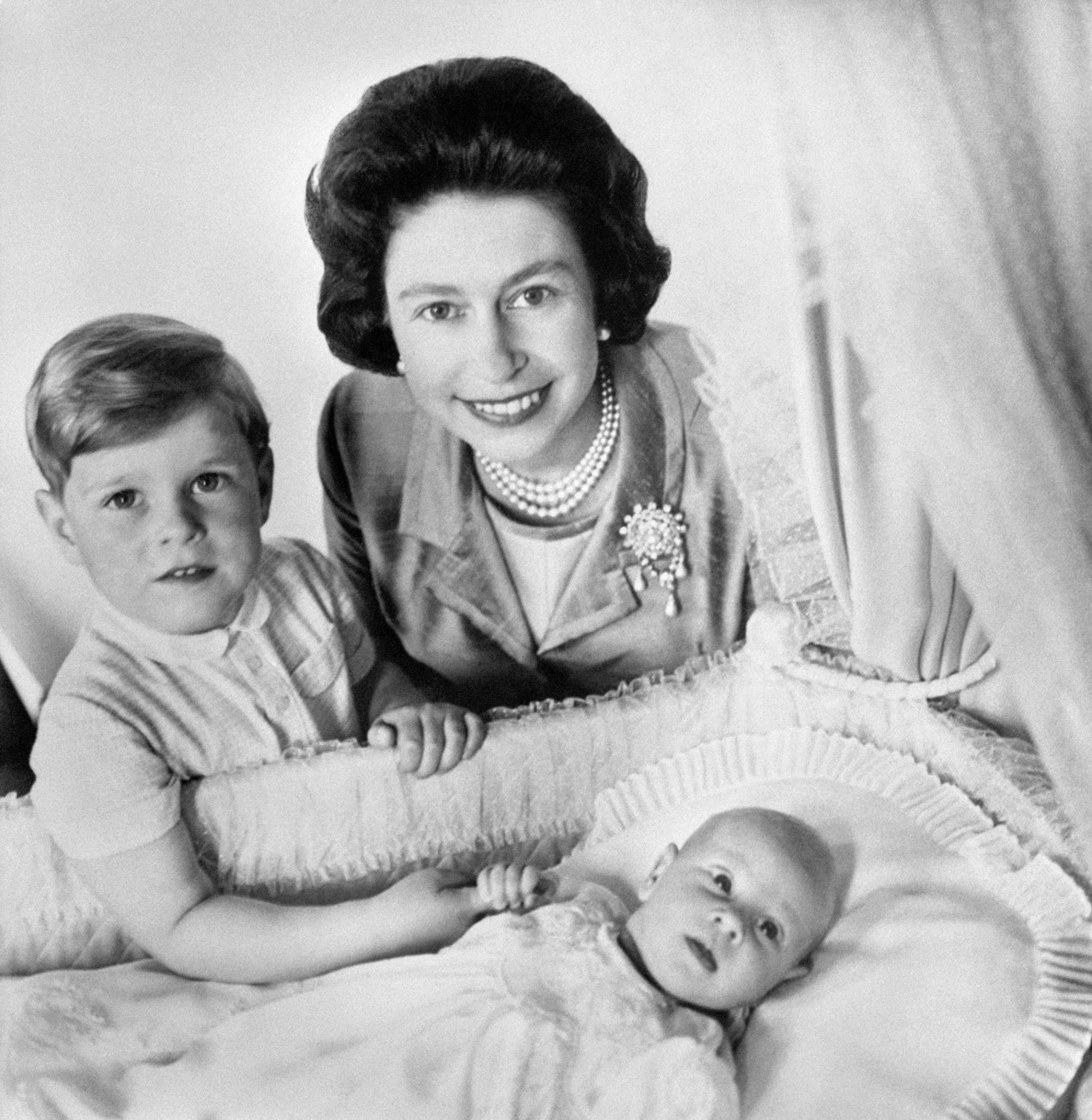 This 1964 snap of Prince Edward in his cot, with brother Andrew and his mother, the Queen, already suggests an interest in what's going on behind the camera. He went on to found a TV production company in 1993.