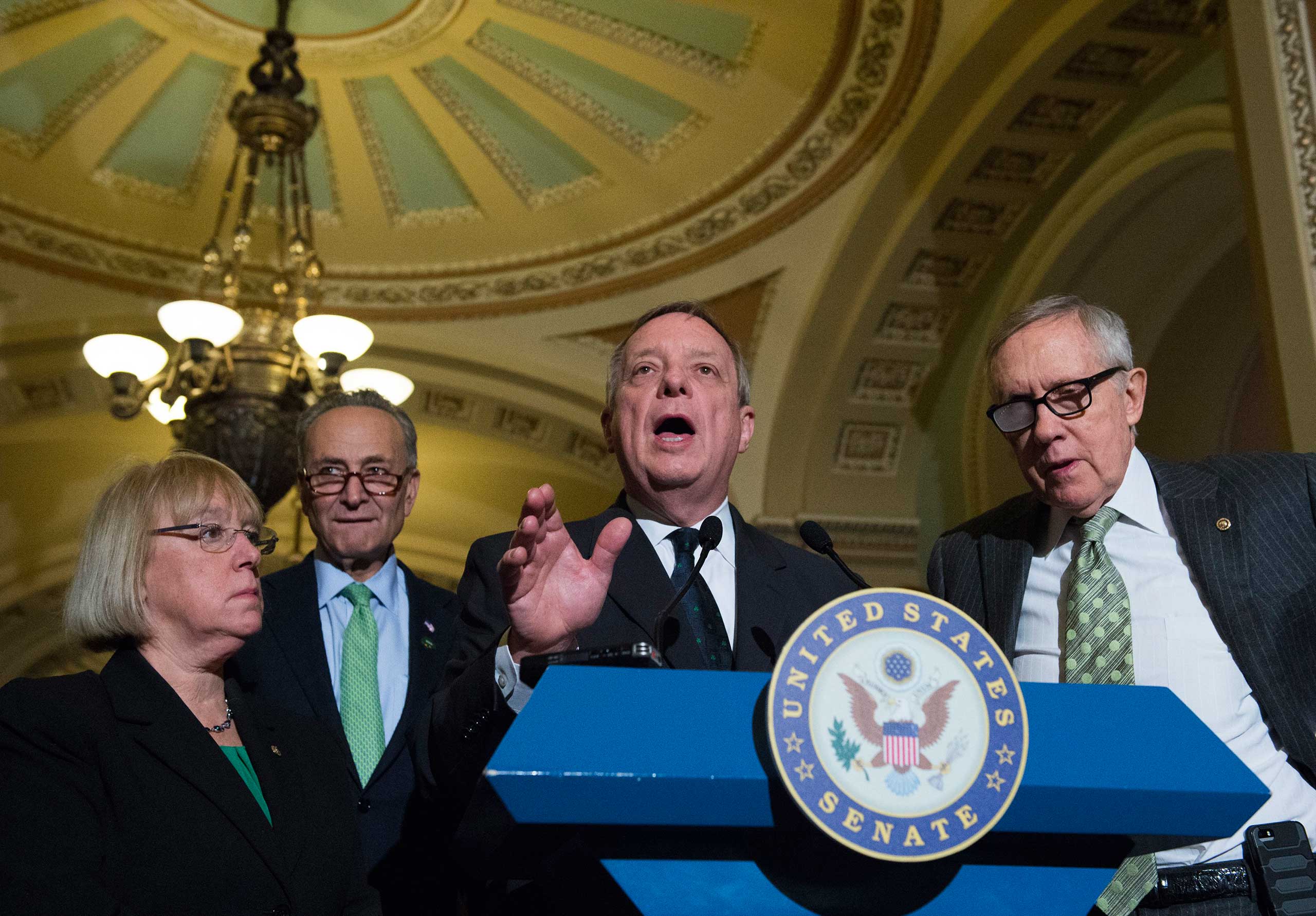 Senate Minority Whip Richard Durbin, D-Ill., speaks to reporters on Capitol Hill in Washington on March 17, 2015. From left are, Sen. Patty Murray, D-Wash., Sen. Charles Schumer, D-N.Y. Durbin, and Senate Minority Leader Harry Reid of Nev.