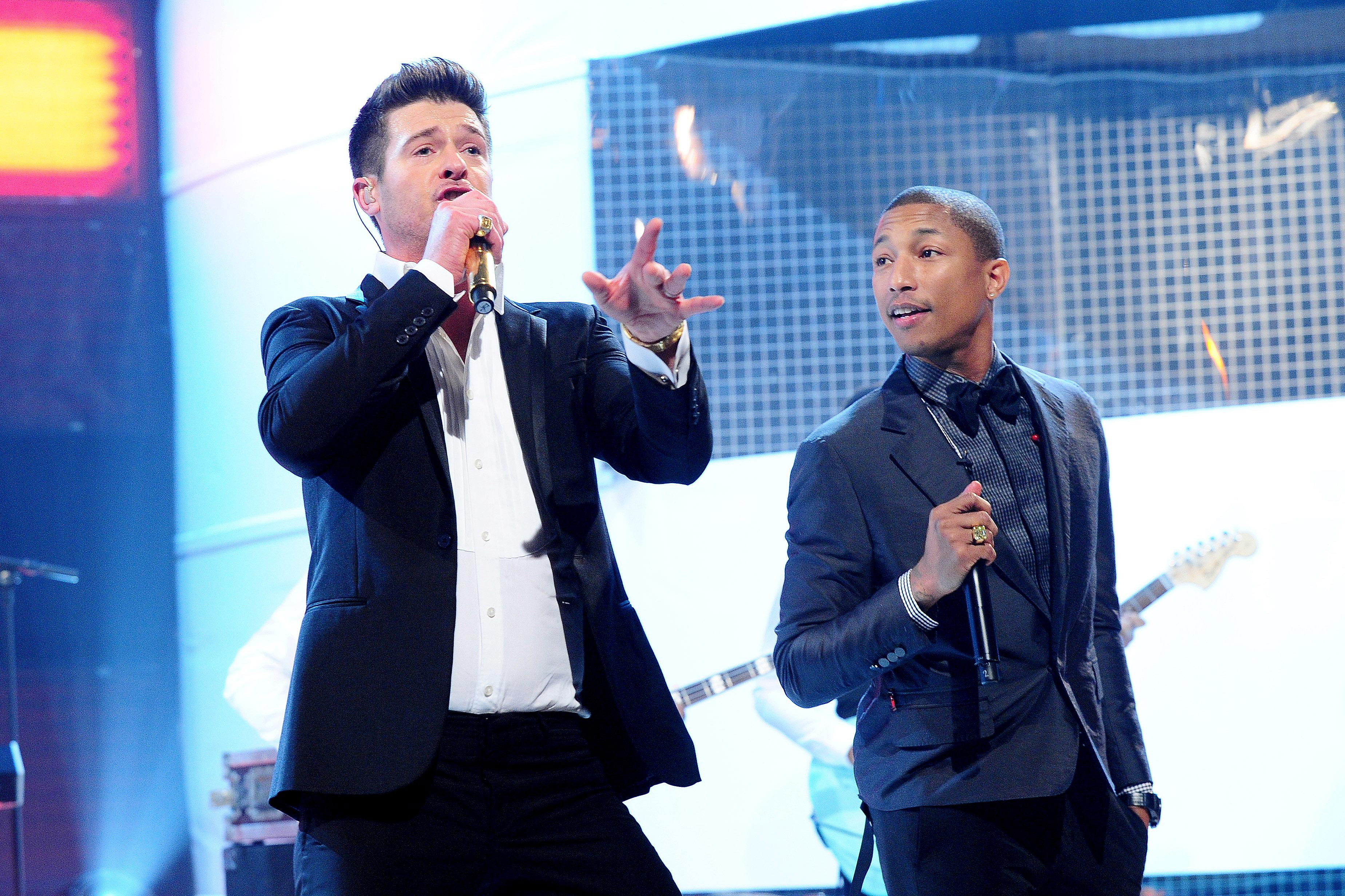 Robin Thicke and Pharrell performing in 2013. (Ian West—PA Wire/Press Association Images)