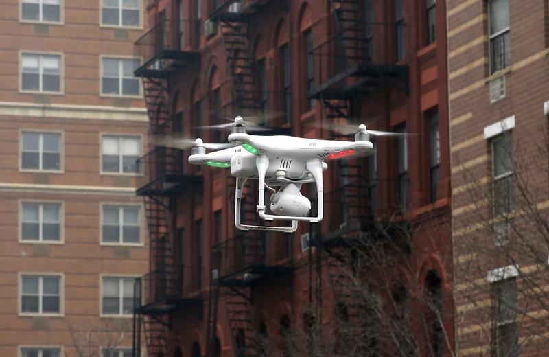 A camera drone flies in New York City, March 12, 2014