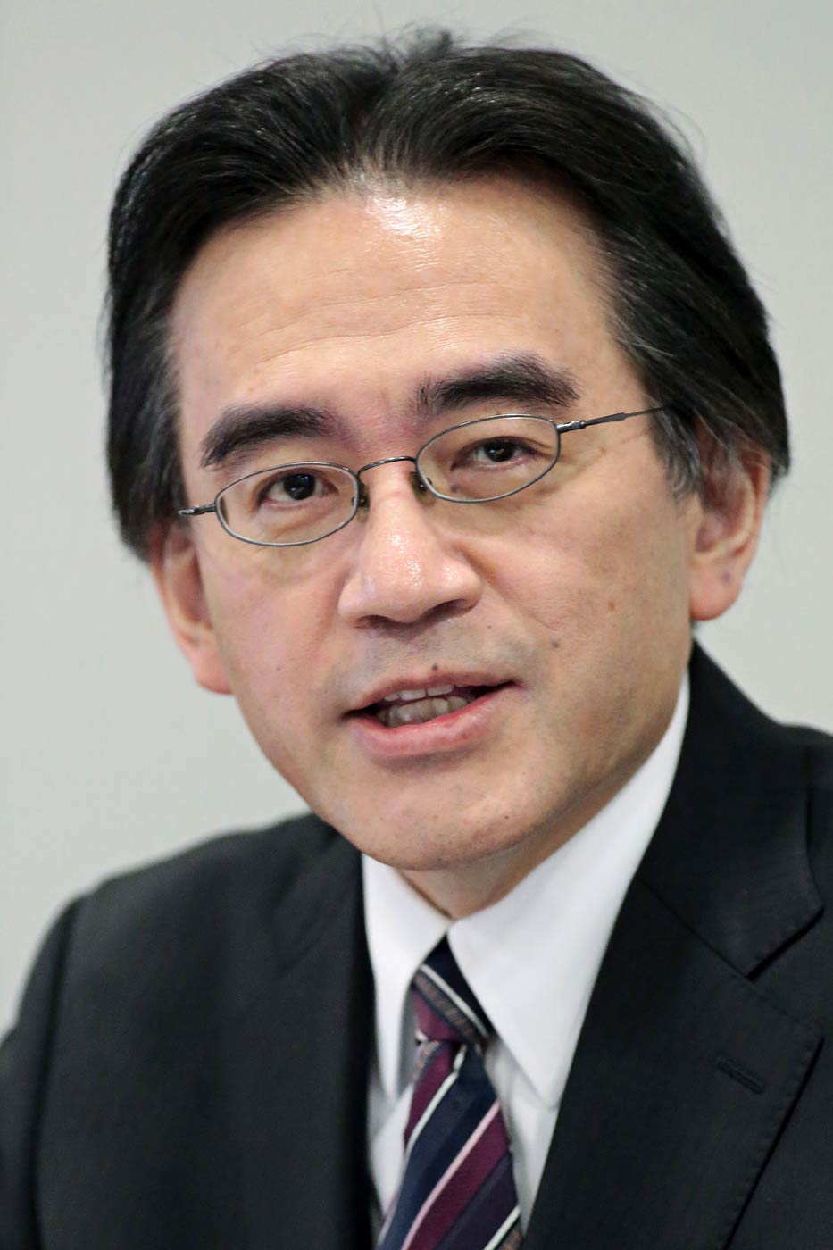 Nintendo President and CEO Satoru Iwata speaks during a news conference in Osaka, Japan, on Oct. 29, 2014. (Yuzuru Yoshikawa—Bloomberg/Getty Images)