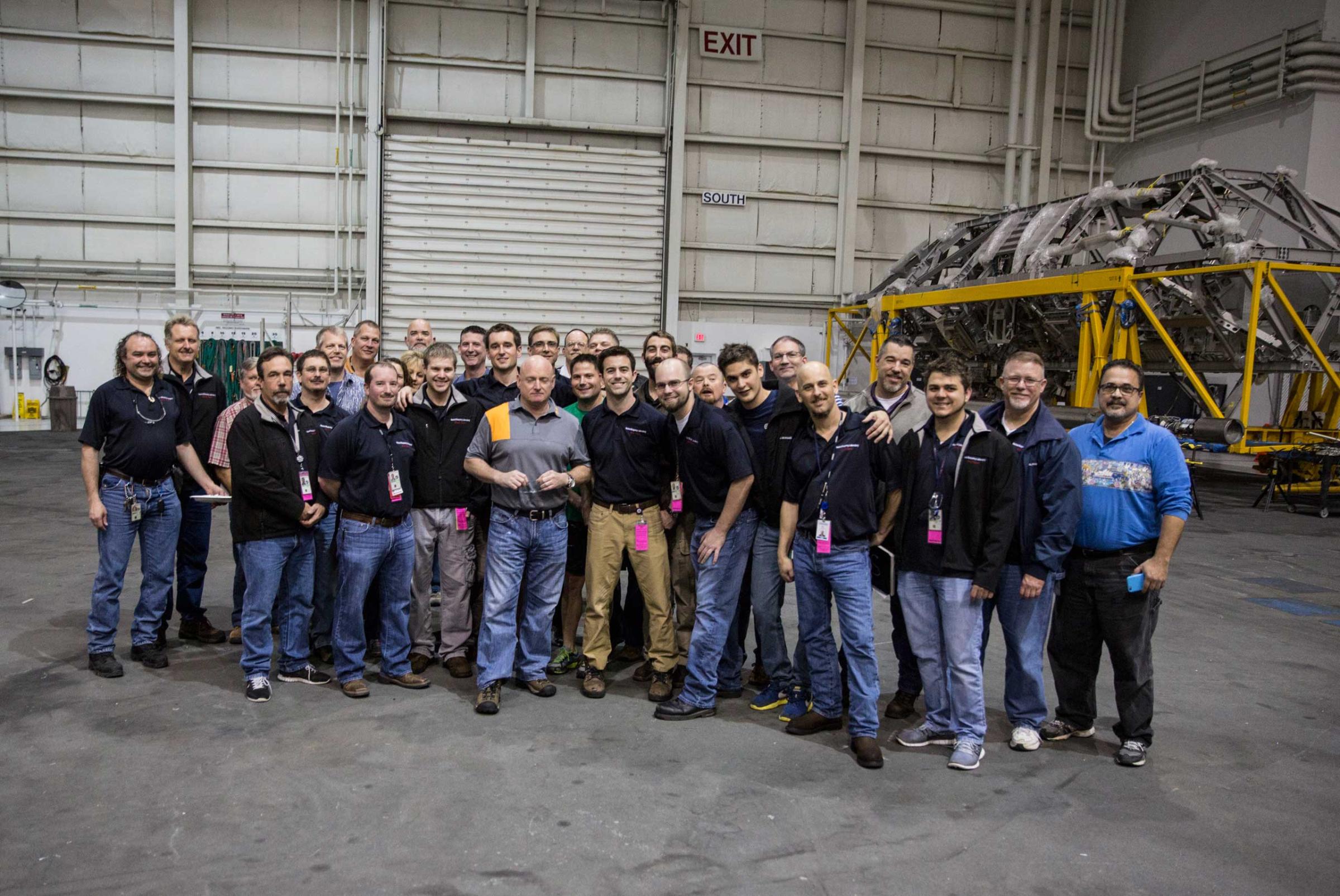 The staff at the Neutral Buoyancy Lab poses for a picture with Scott on Feb. 3.