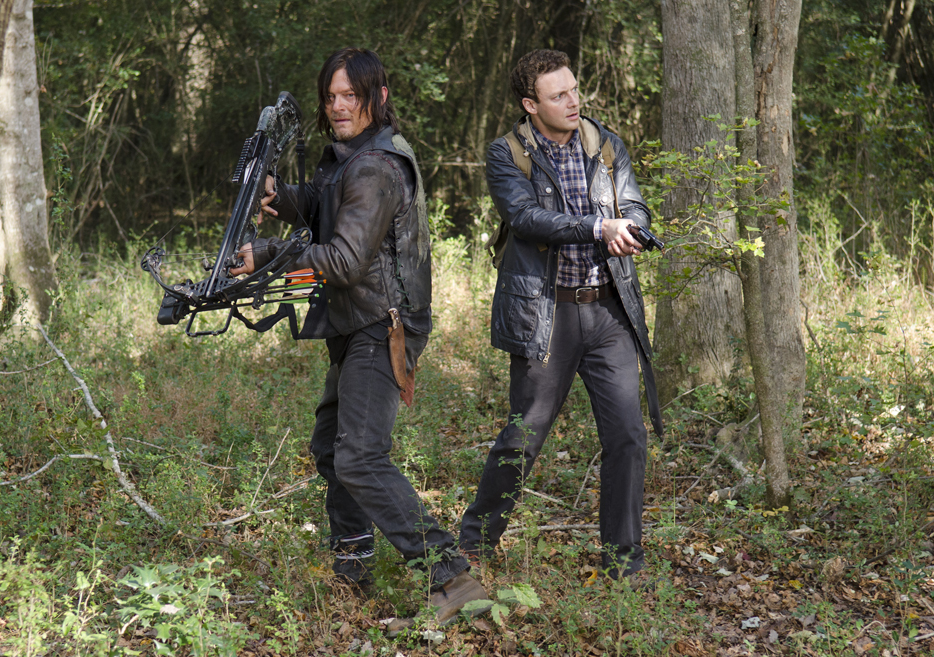 Norman Reedus (L) and Ross Marquand (R) in episode 15 of AMC's 'Walking Dead.'