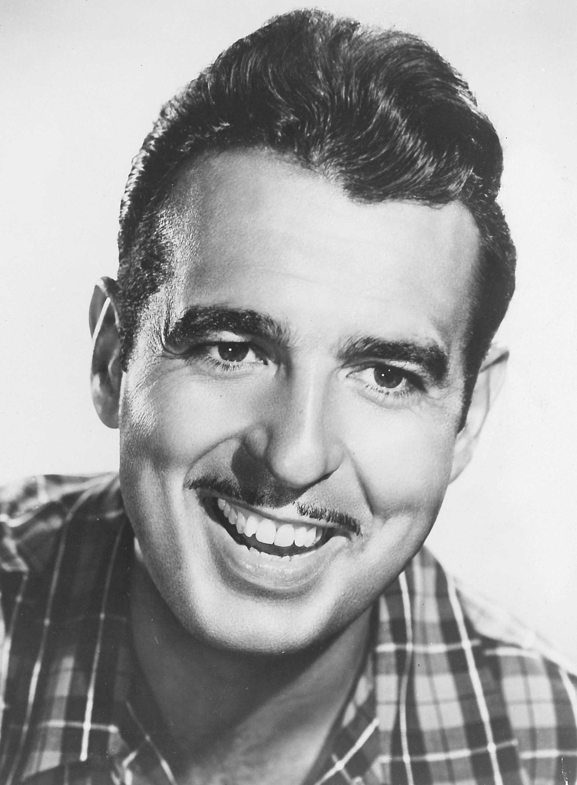 Released as a B-side, Tennessee Ernie Ford's cover of  Sixteen Tons  stood out among more lighthearted country songs of the 1950s. (Library of Congress)