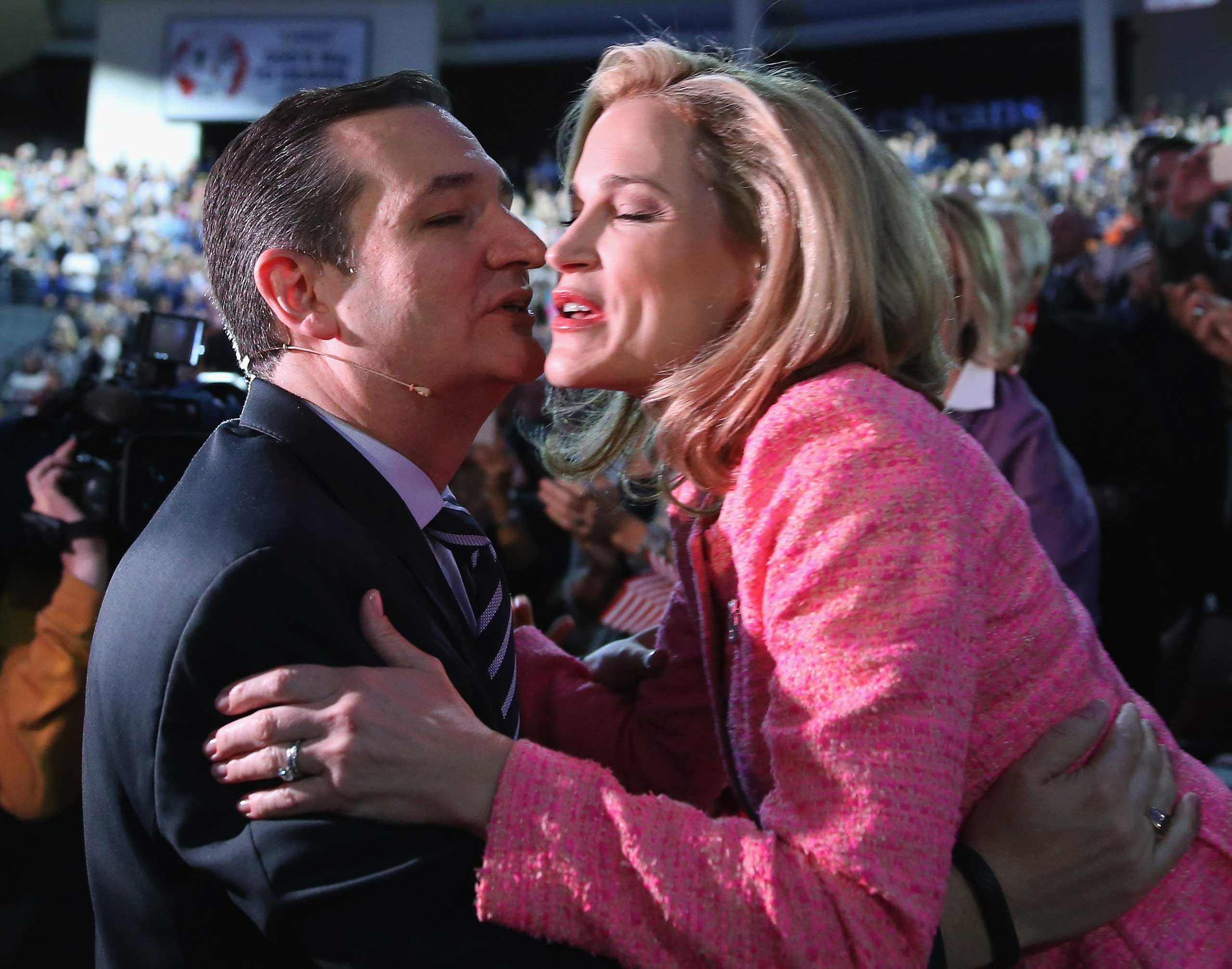 Texas Sen. Ted Cruz kisses his wife before walking onstage to speak at Liberty University in Lynchburg, Va., to announce his presidential candidacy on March 23.