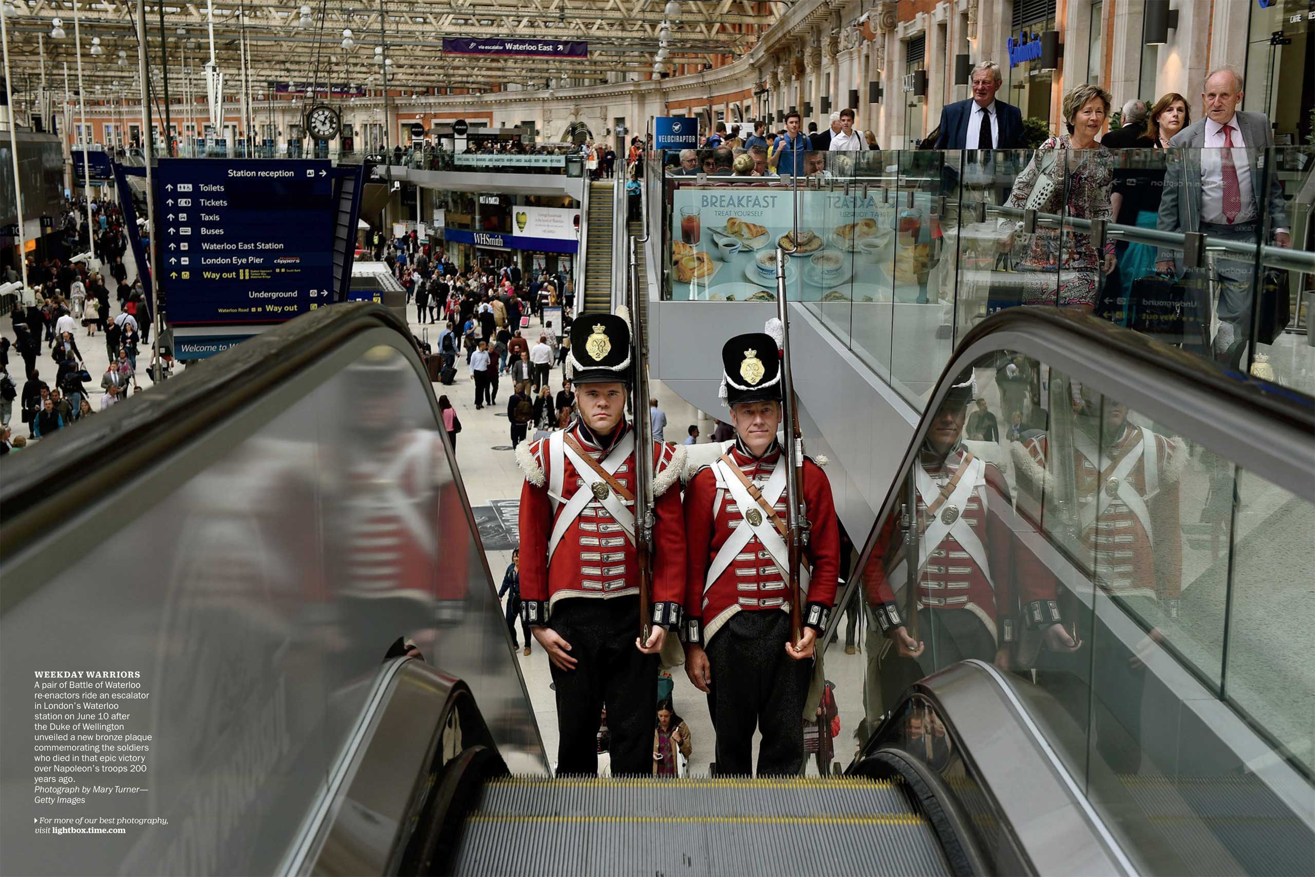 Photograph  by Mary Turner—Getty ImagesA pair of Battle of Waterloo re-enactors ride an escalator in London's Waterloo station on June 10 after the Duke of Wellington unveiled a new bronze plaque commemorating the soldiers who died in that epic victory over Napoleon's troops 200 years ago. (TIME issue June 22, 2015)