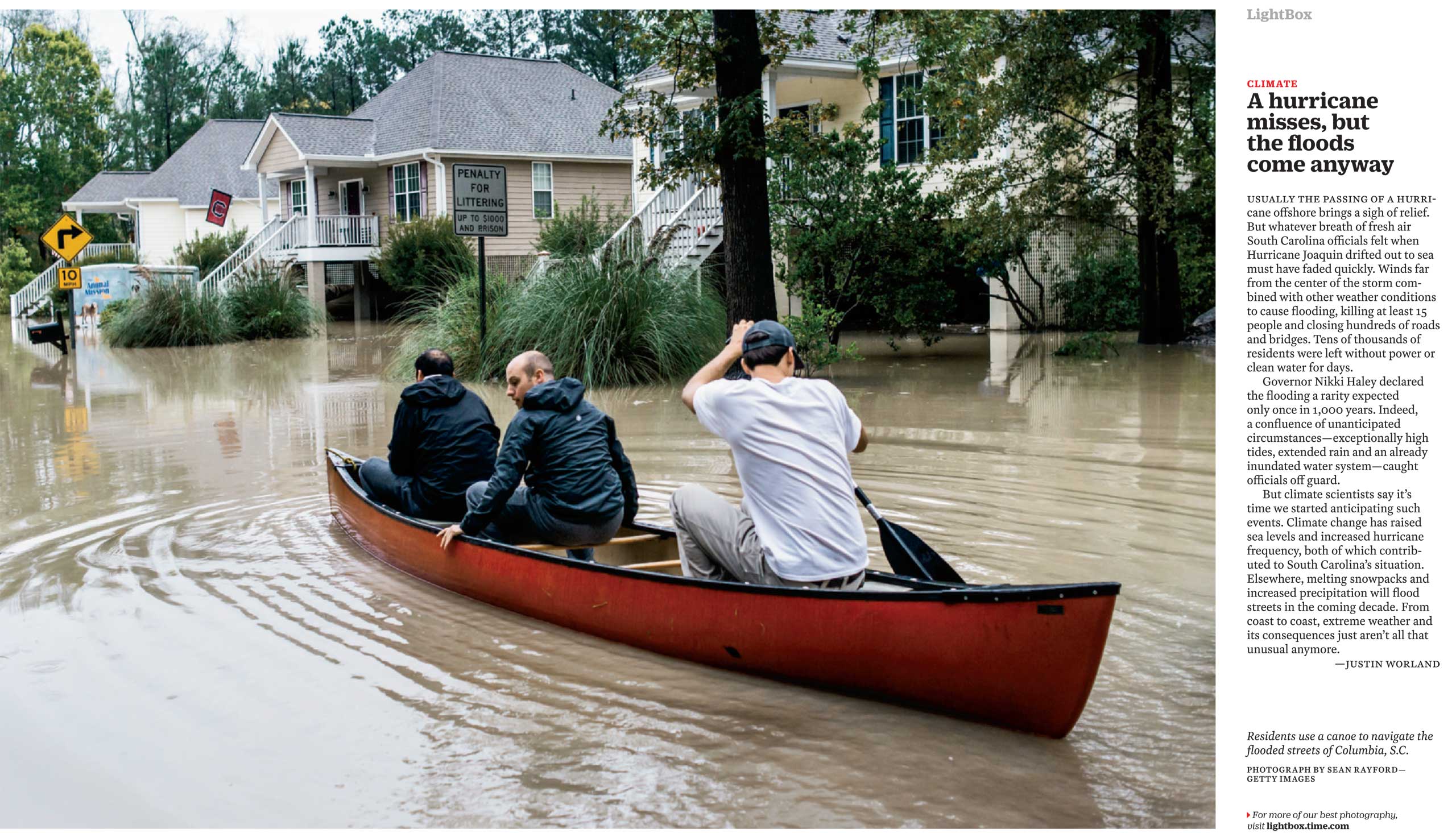 Photograph by Sean Rayford—Getty ImagesResidents use a canoe to navigate the flooded streets of Columbia, S.C.. (TIME issue October 19, 2015)