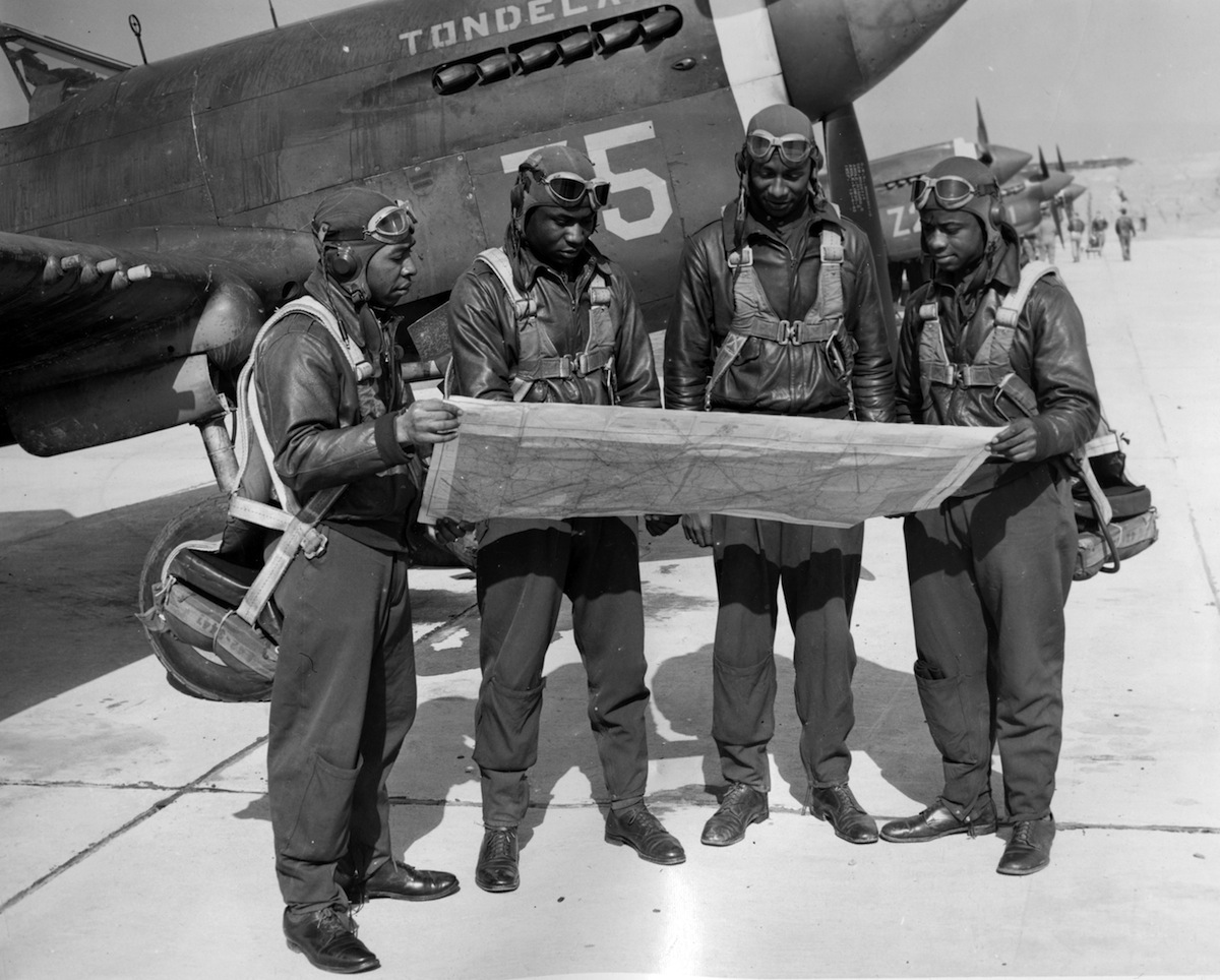 Tuskegee Airmen studying maps in Tuskegee, Ala., 1942. (Afro Newspaper / Gado / Getty Images)