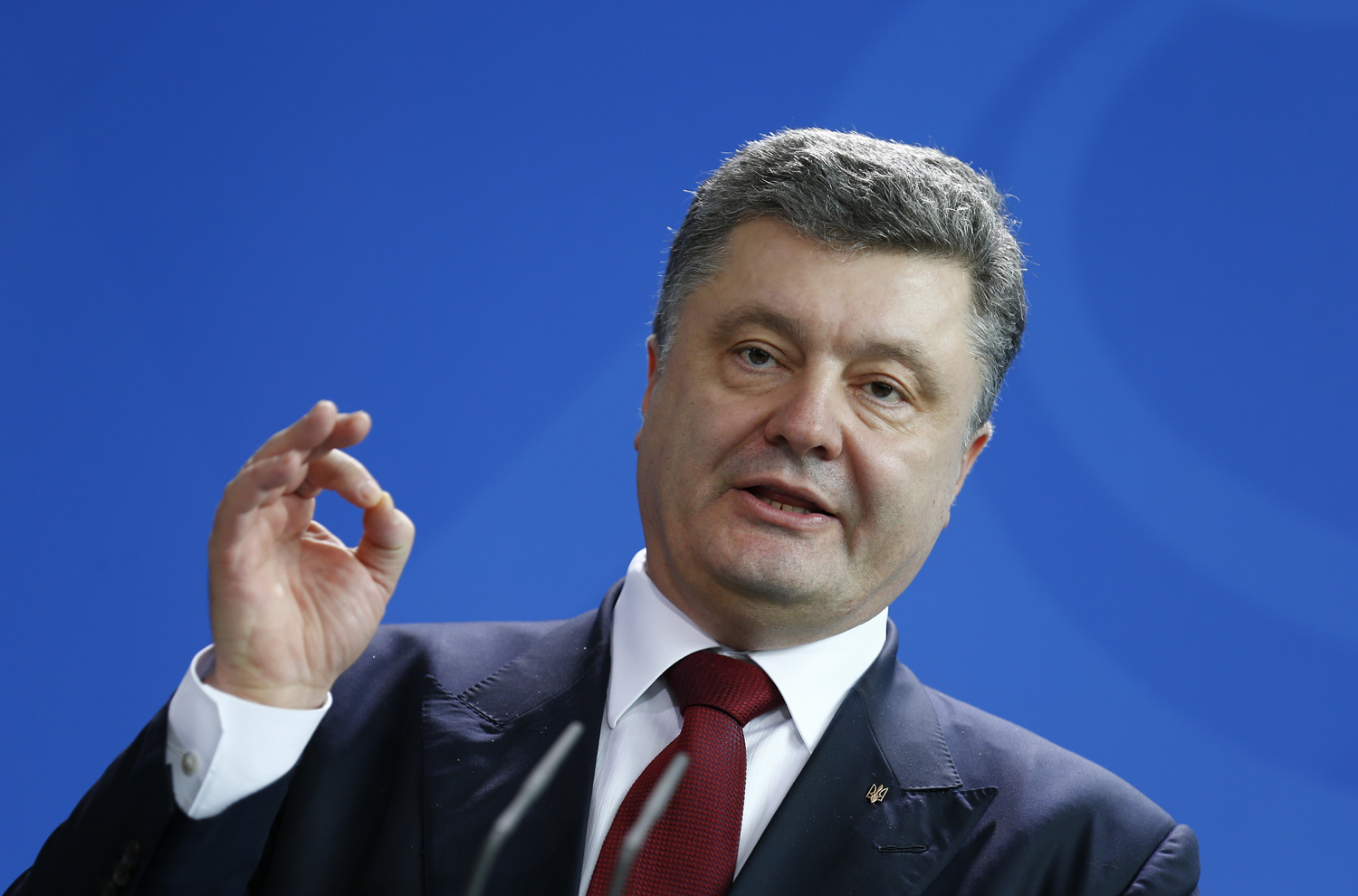 Ukrainian President Poroshenko addresses news conference following talks in Berlin