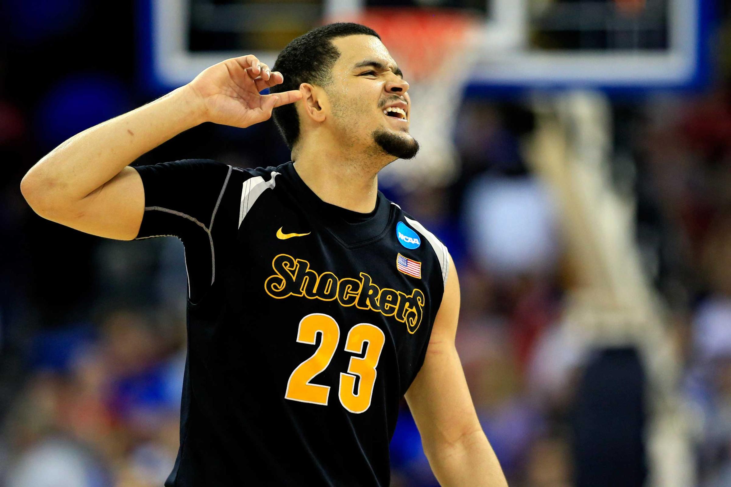 Fred VanVleet of the Wichita State Shockers celebrates as the second half ends against the Kansas Jayhawks during the third round of the 2015 NCAA Men's Basketball Tournament at the CenturyLink Center in Omaha, Neb. on March 22, 2015.