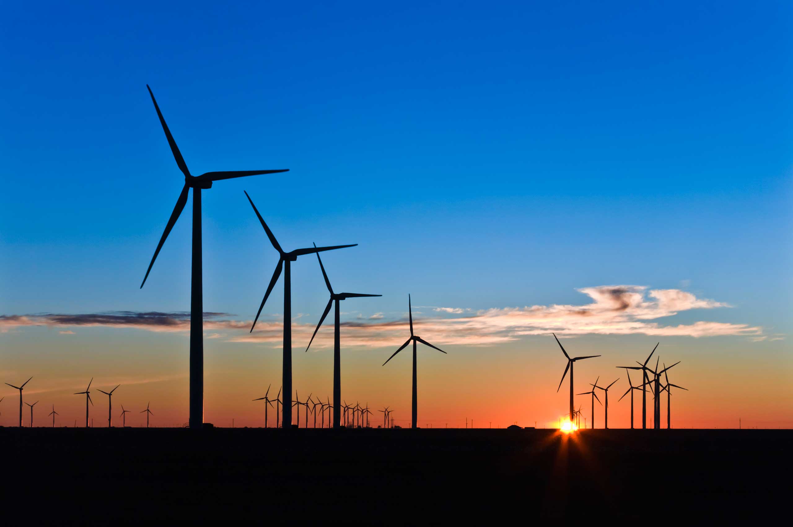 Wind Turbines at Sunrise (Getty Images)