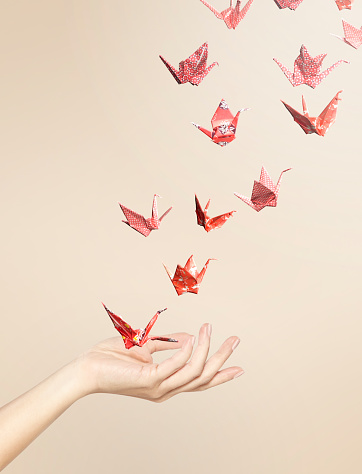 red-origami-cranes-flying