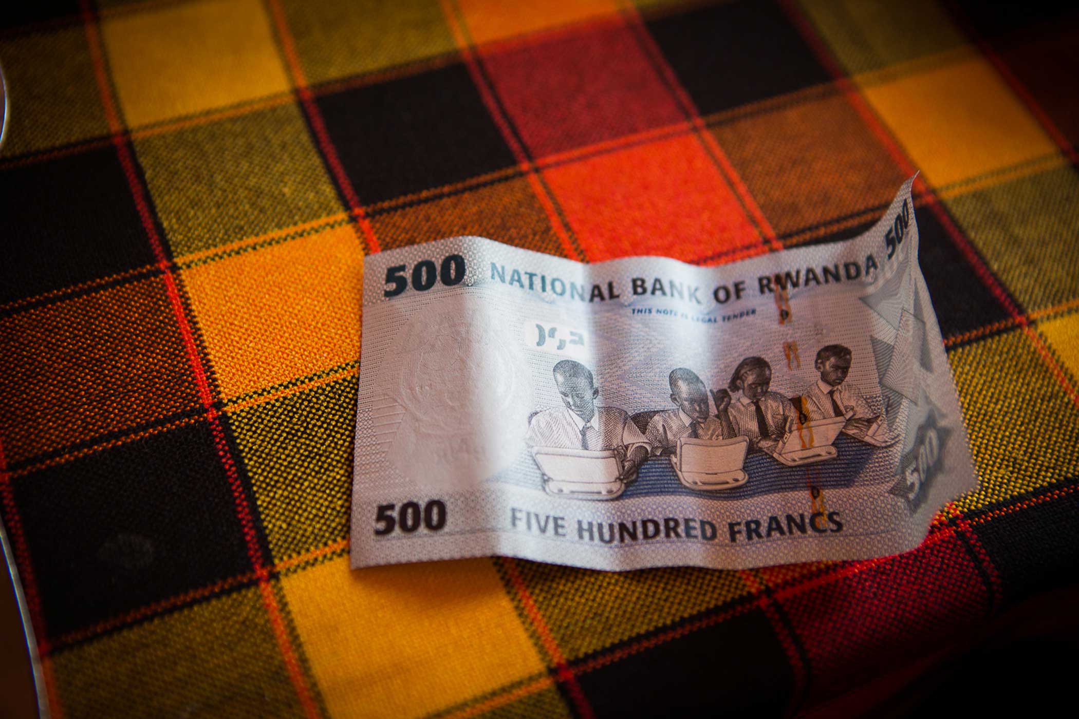 The Rwandan five hundred francs bill features students on laptops, representing the one laptop a child movement. (Cassandra Giraldo)