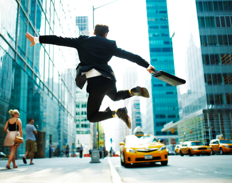businessman-jumping-street