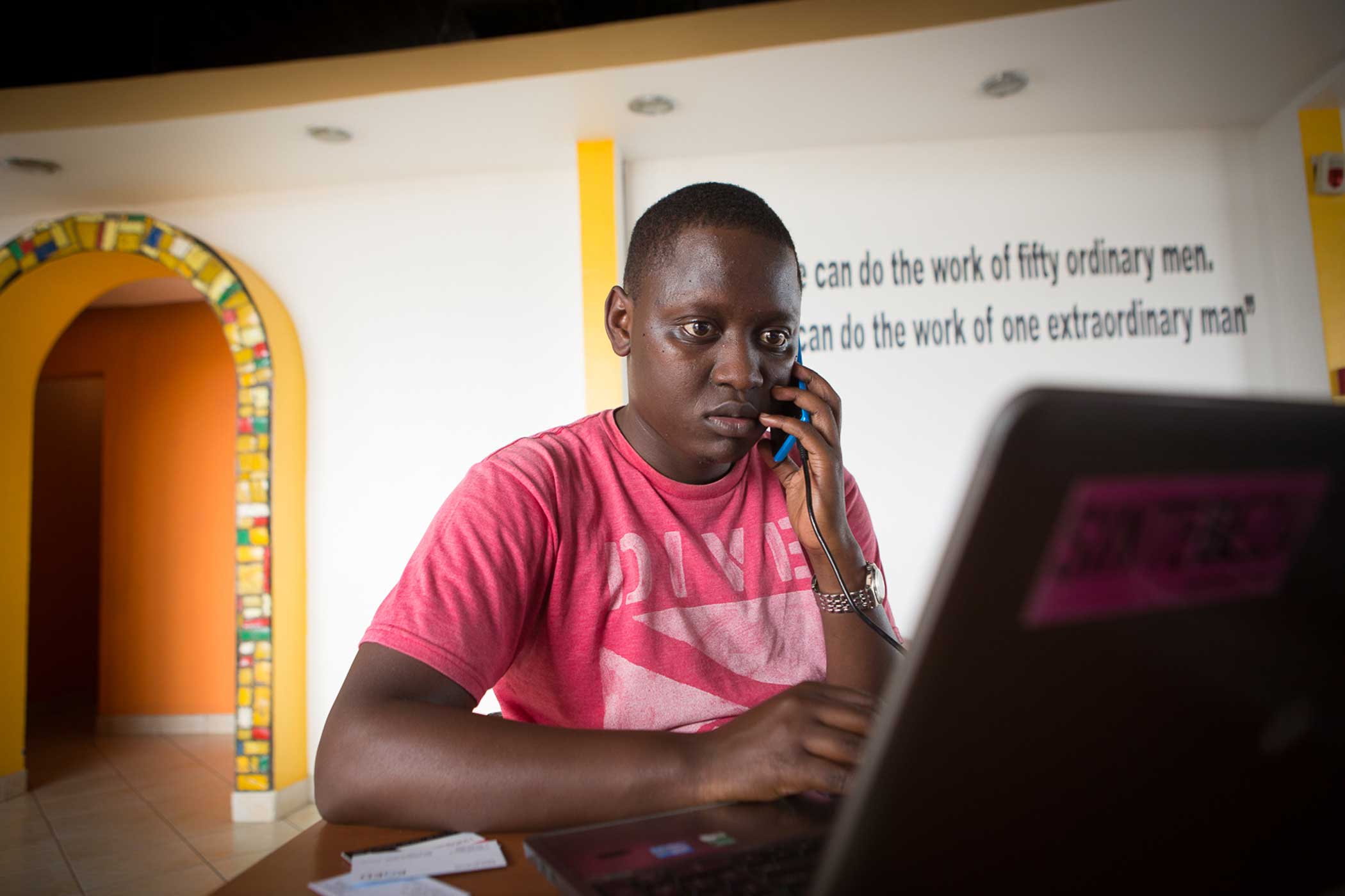 Aphrodice Mutangana, 30, working at the kLab co-working space in Kigali. (Cassandra Giraldo)
