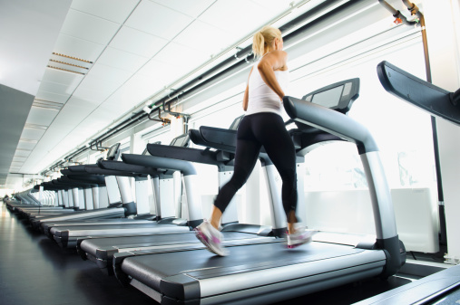 woman-running-treadmill-gym
