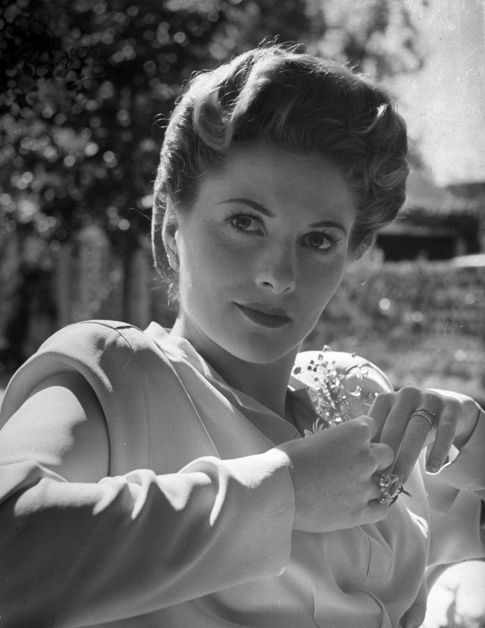 Joan Fontaine in her film make-up and pompadour.