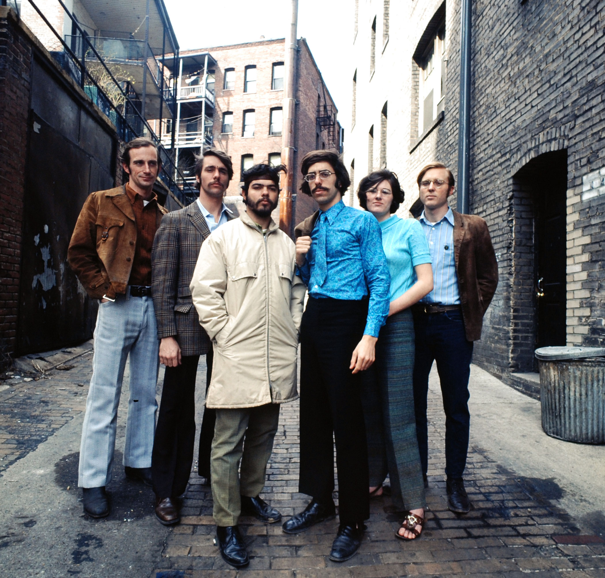 In a Washington D. C. ghetto, key Earth Day staffers (from left) Denis Hayes, Andrew Garling, Arturo Sandoval, Stephen Cotton, Barbara Reid and Bryce Hamilton gather for a group portrait.