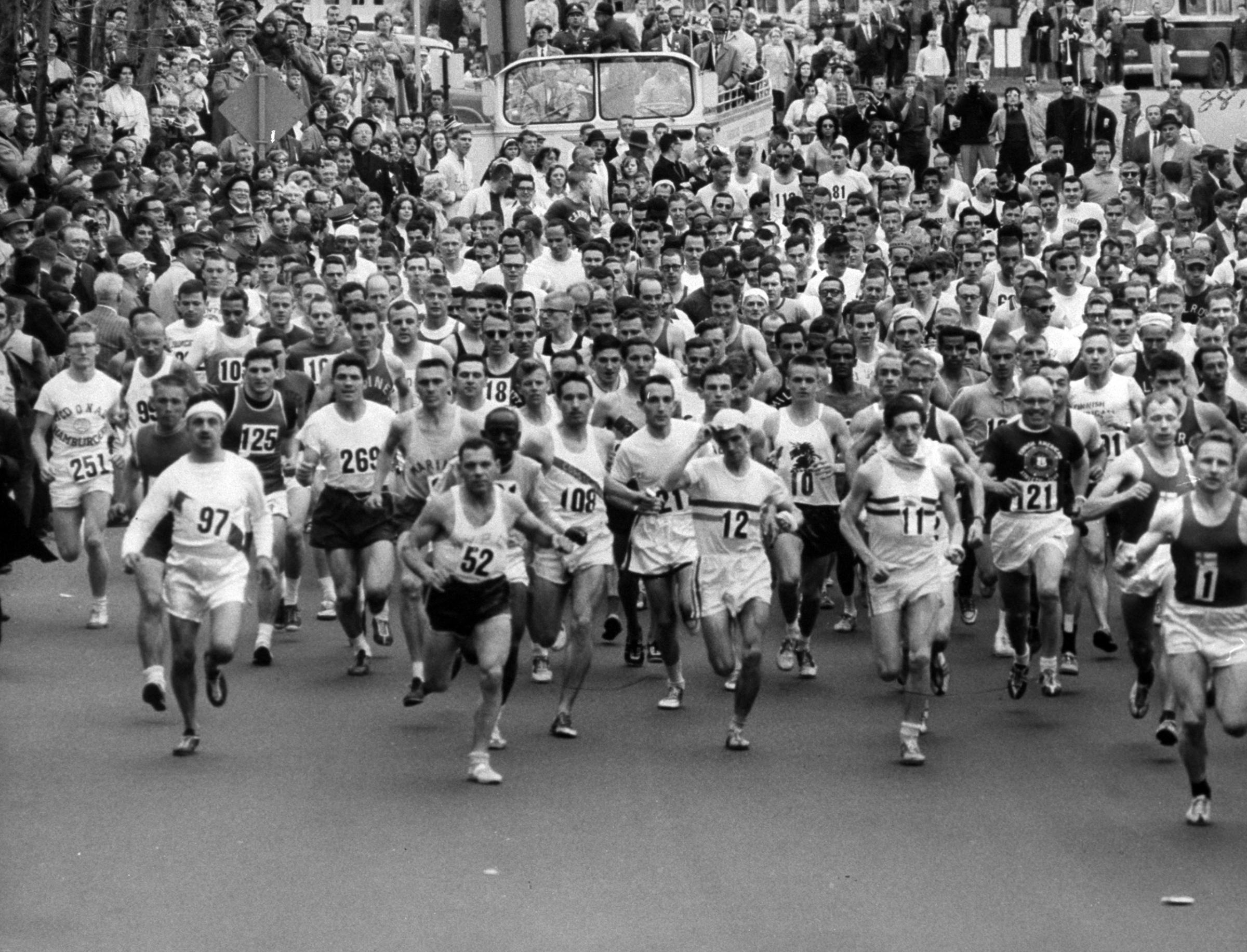 237 runners competing in annual Boston Marathon crossing the starting line, 1963.