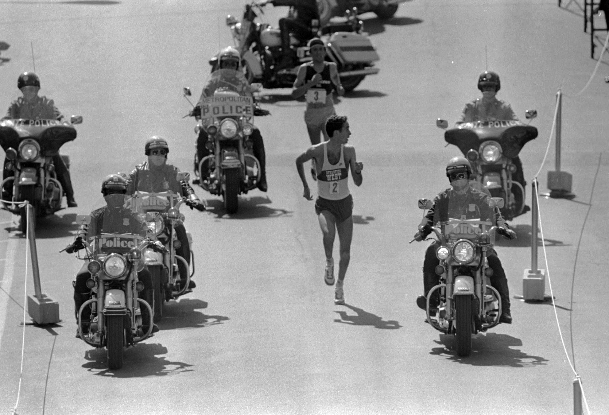 Alberto Salazar  looks over his shoulder to check on Dick Beardsley, rear, as they neared the finish line April 19, 1982 in the 86th annual Boston Marathon.  Salazar went on to win the 26-mile, 385-yard distance in 2:08.51.  Beardsley followed by two seconds.