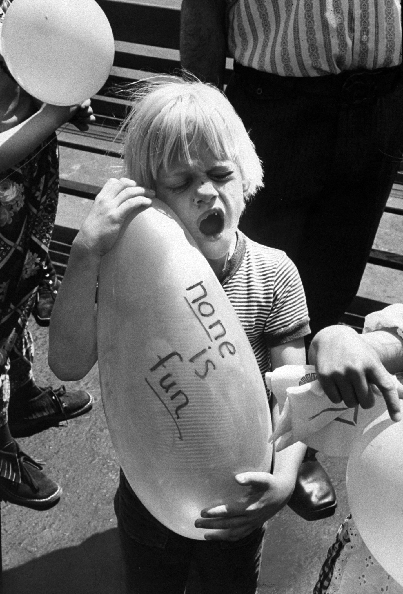 <b>Caption from TIME.</b> Child protesting against parenthood; A gift on Non-Father's Day. (Ralph Crane—The LIFE Picture Collecton/Getty Images)