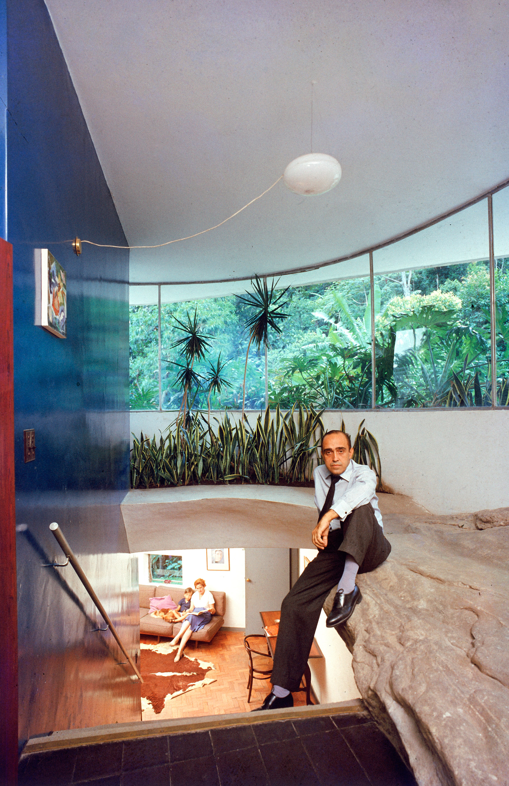 Portrait of Brazilian architect Oscar Niemeyer in his self designed home, 1959.