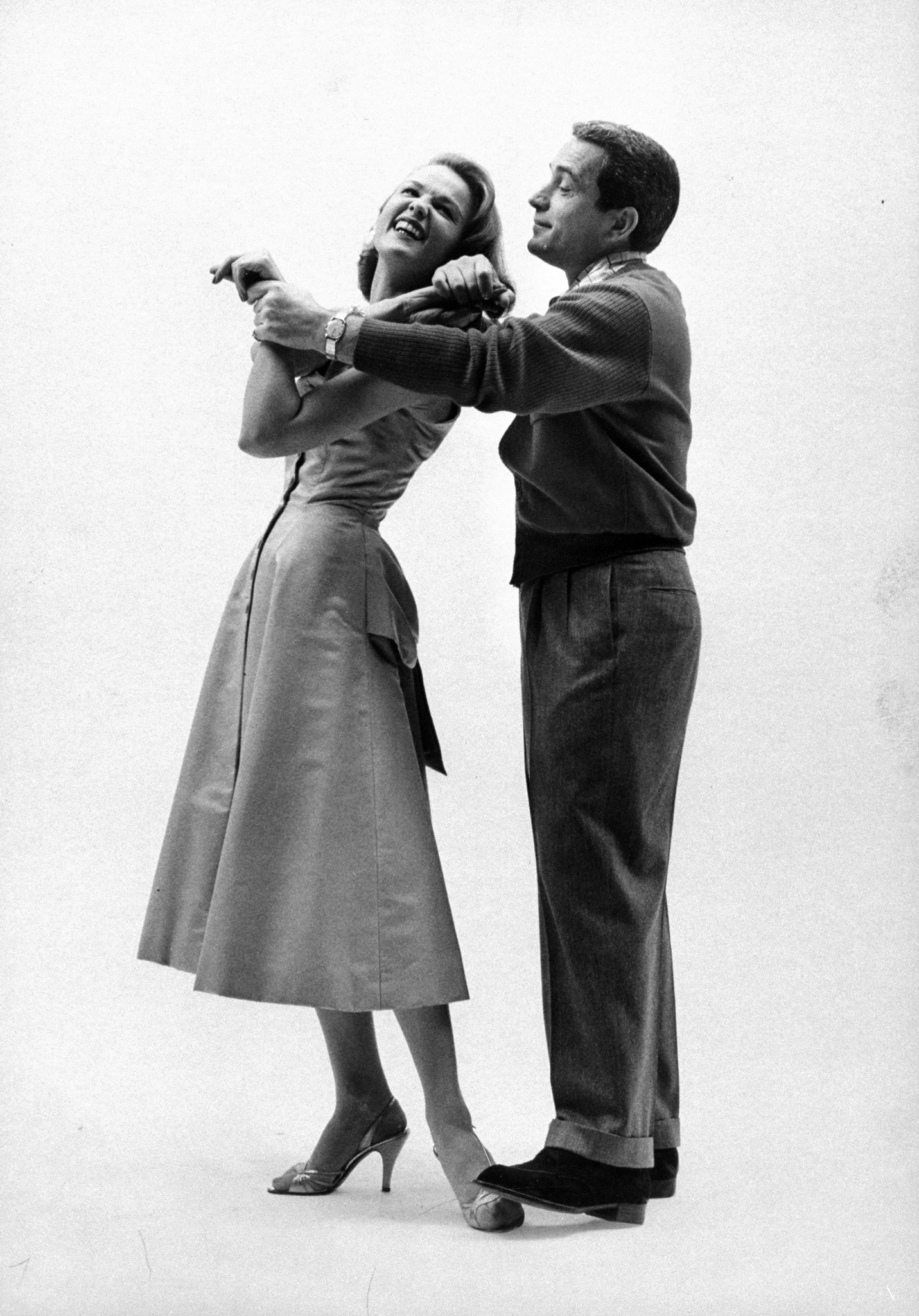 He must take her dancing. she would like him to take her to a movie or a meal, but she insists that he take her dancing. Perry obliges, but steps on partner's toes. This is because 69% of the girls said it was not important for a husband to be a good dancer. All she requires is that he try.