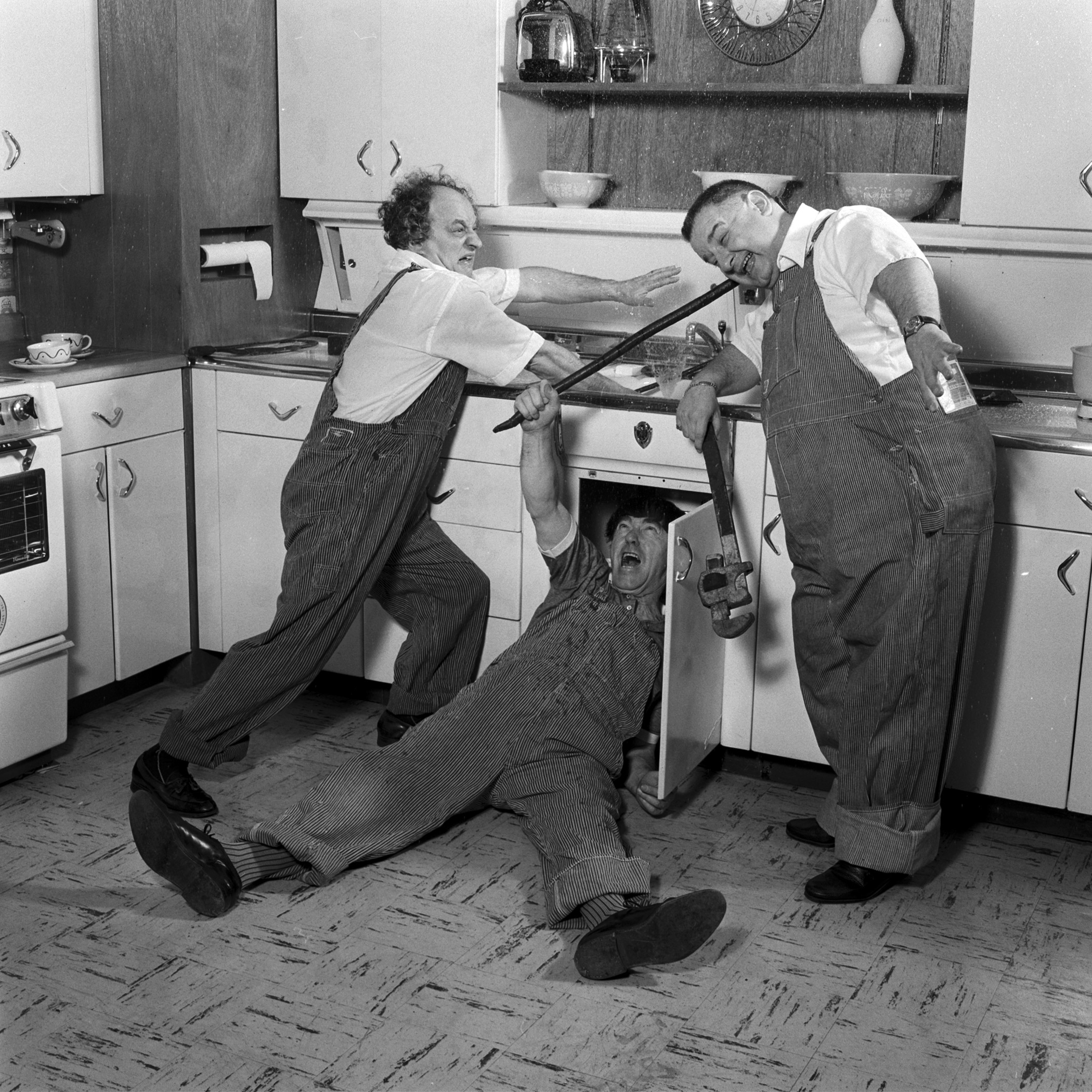 Three Stooges acting out a skit in May 1959.
