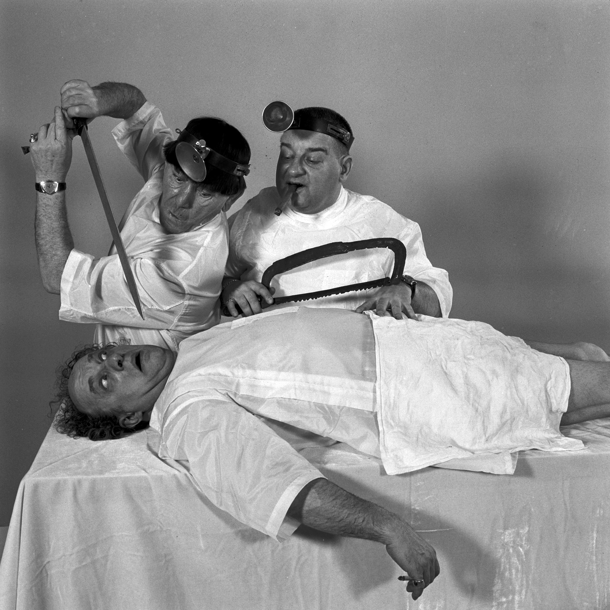 Three Stooges acting out a skit in May 1959.