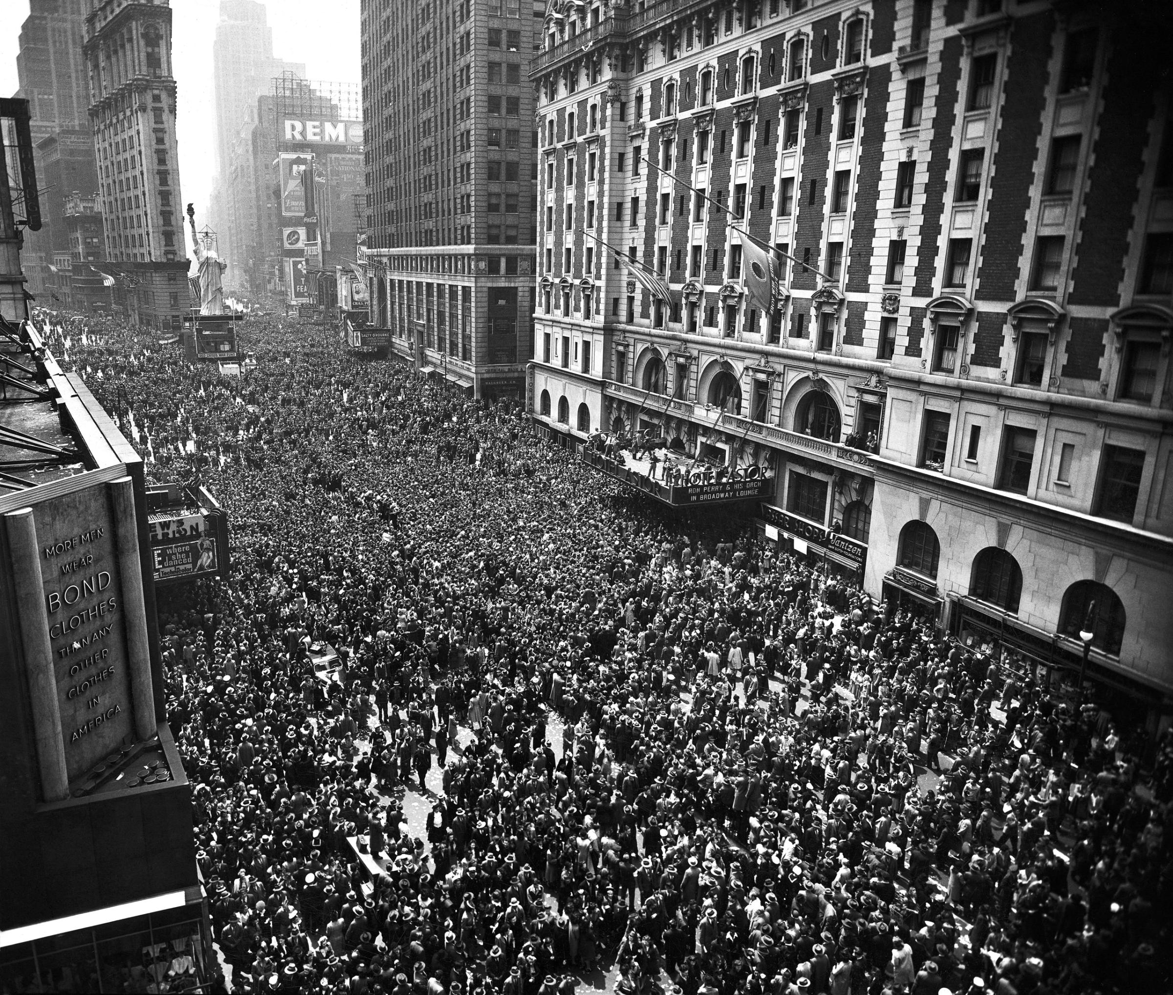 Some 500,000 celebrants swarm into Times Square the morning of May 7 after the A.P. announcement that Germany had surrendered. Over a public-address system Mayor Laguardia told all to go home or return to their jobs.