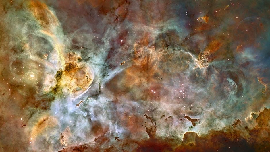 Carina Nebula:
                              
                              This is one of the largest panoramic images  ever taken with Hubble's cameras. It is a 50-light-year-wide view of the central region of the  Carina Nebula where a maelstrom of star birth - and death - takes place. The immense nebula contains at least a dozen brilliant stars that are roughly estimated to  be at least 50 to 100 times the mass of our Sun. 
                              
                              Image released on April 24, 2007
