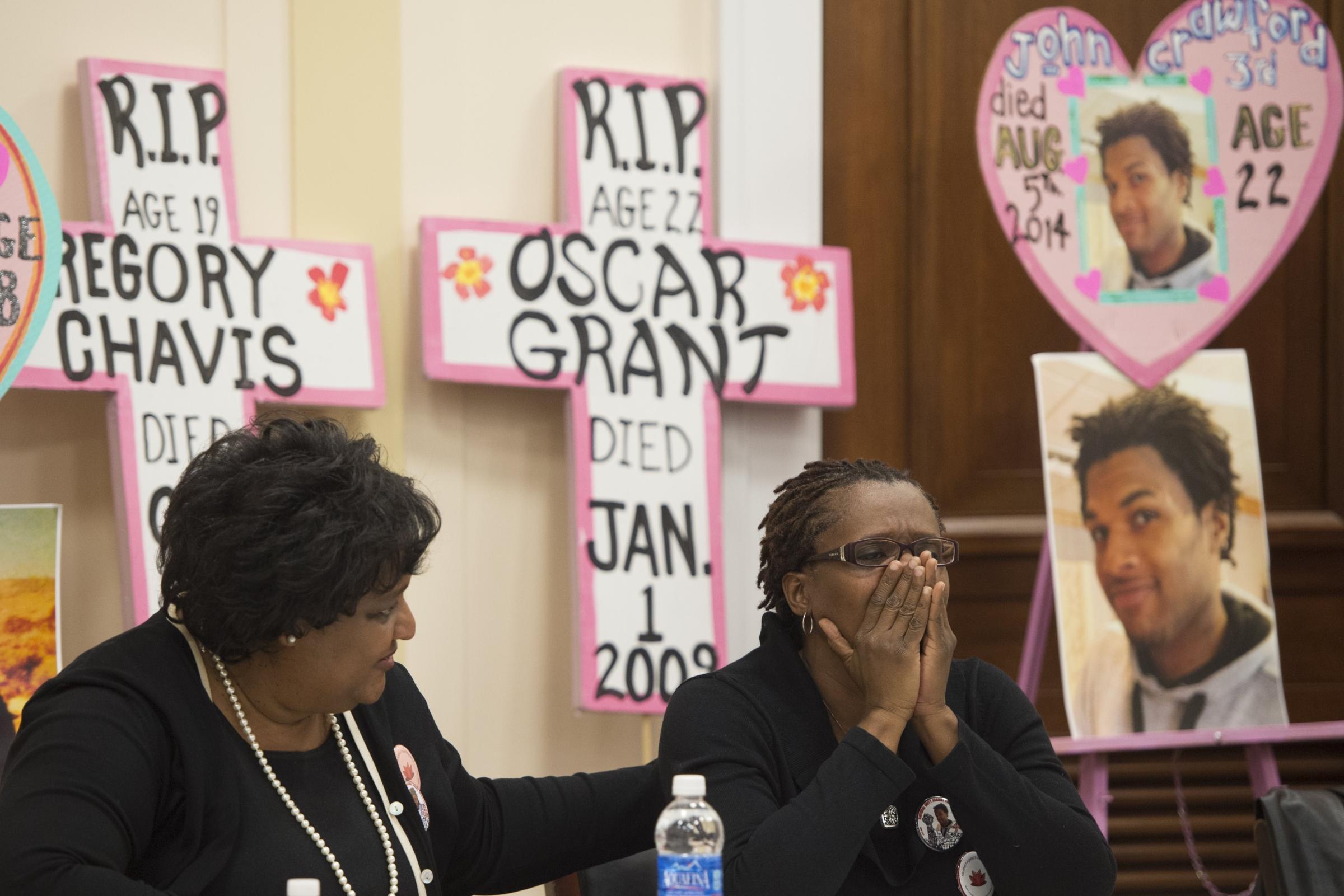 Mothers who have lost sons due to police action, including Tressa Sherrod (R), mother of 22-year-old John Crawford III, attend a press conference calling for police accountability and reform on Capitol Hill in Washington on Dec. 10, 2014.