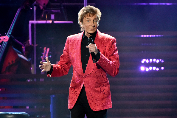 Barry Manilow performs on stage during the One Last Time Tour at United Center in Chicago on Feb. 14, 2015 (Daniel Boczarski—Getty Images)