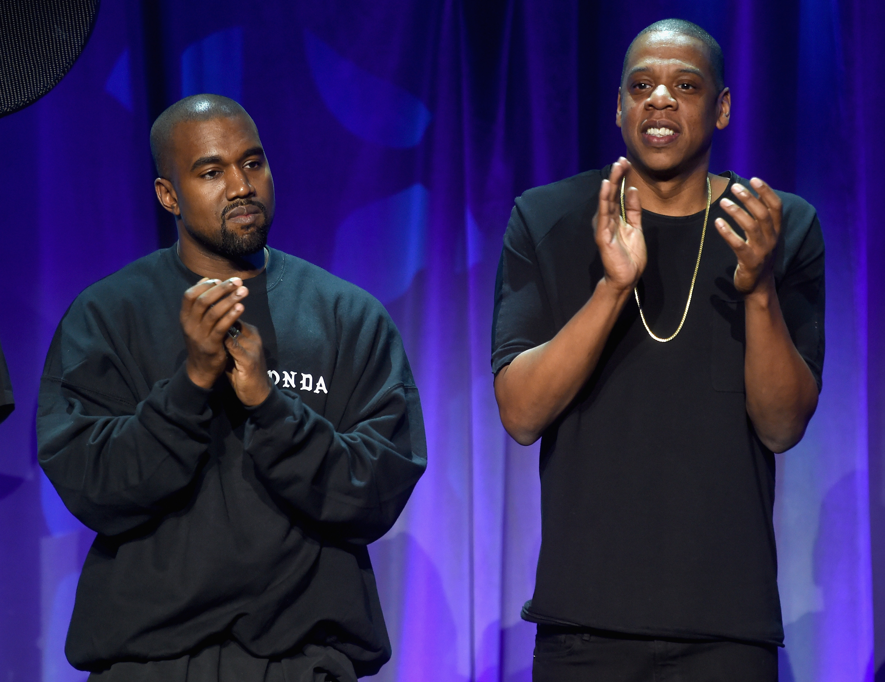 Kanye West (L) and JAY-Z onstage at the Tidal launch event #TIDALforALL at Skylight at Moynihan Station on March 30, 2015 in New York City. (Jamie McCarthy&mdash;2015 Getty Images)