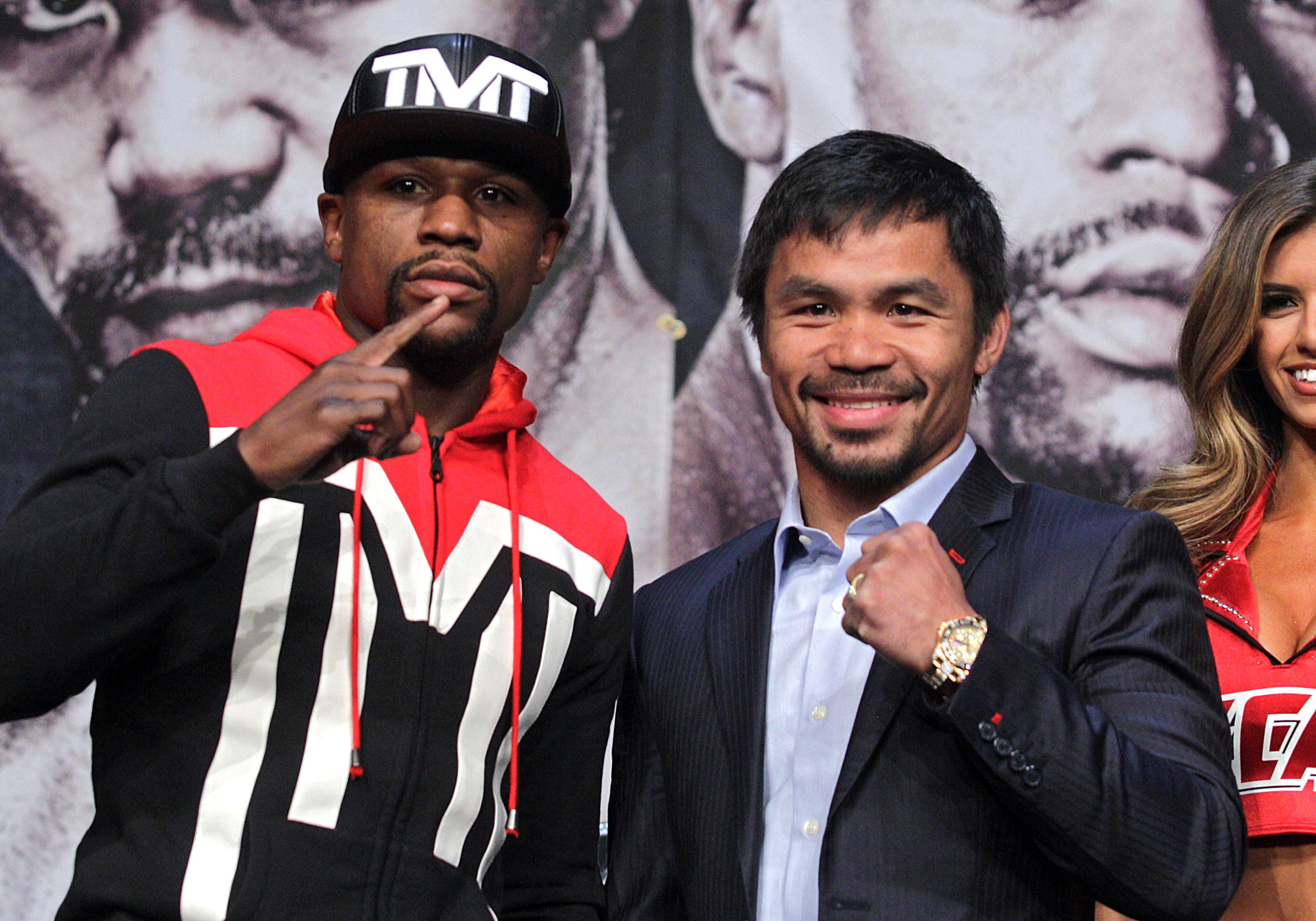 WBC/WBA welterweight champion Floyd Mayweather Jr. (L) and WBO welterweight champion Manny Pacquiao pose during a news conference at the KA Theatre at MGM Grand Hotel &amp; Casino on April 29, 2015 in Las Vegas, Nevada. (John Gurzinski&mdash;AFP/Getty Images)