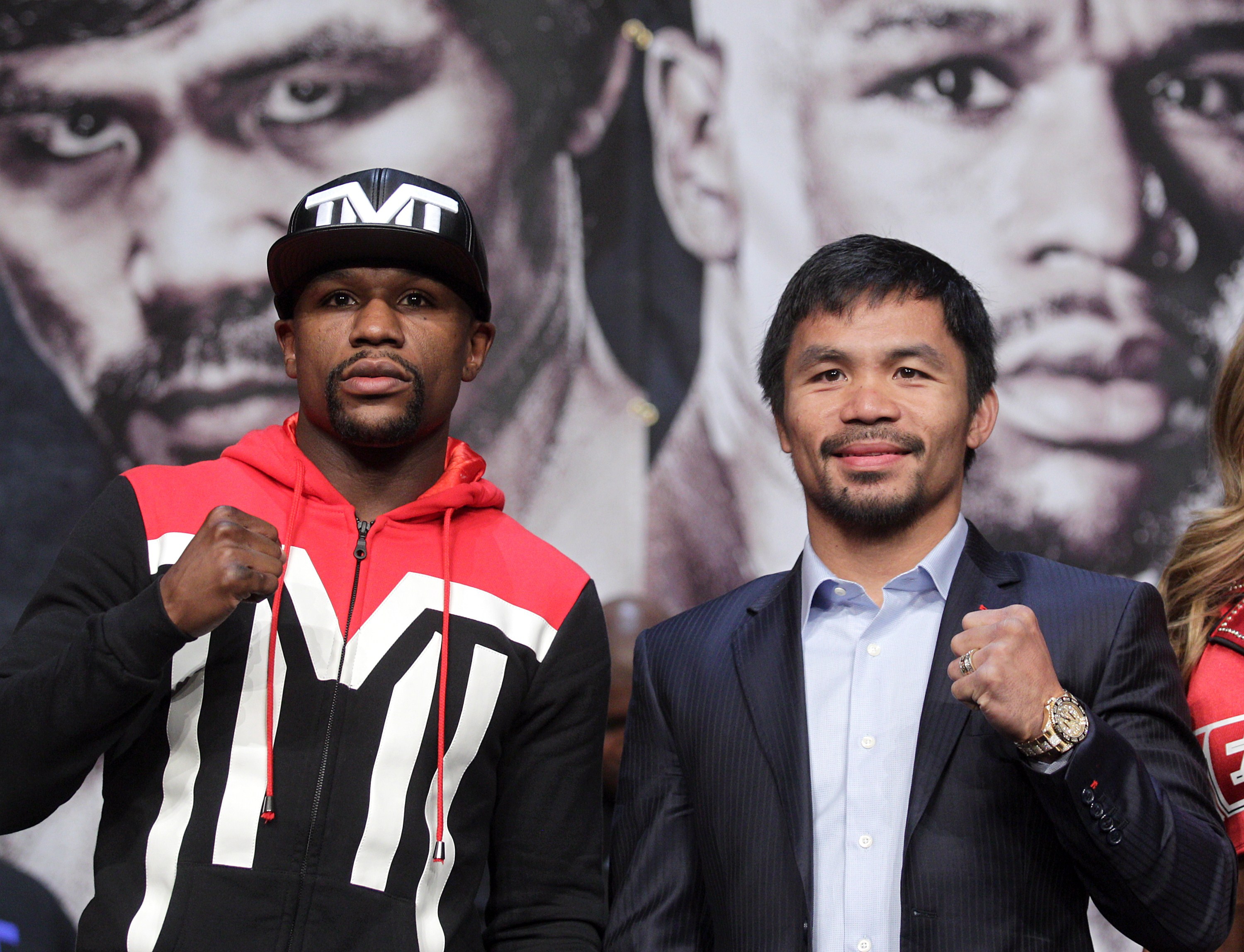 Floyd Mayweather Jr. (L) and Manny Pacquiao pose during a news conference at the KA Theatre at the MGM Grand Hotel &amp; Casino on April 29, 2015 in Las Vegas, Nevada. (JOHN GURZINSKI&amp;mdash;AFP/Getty Images)