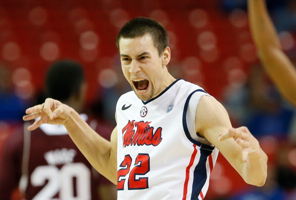 Marshall Henderson of the Mississippi Rebels reacts after hitting a three-point basket against the Mississippi State Bulldogs at Georgia Dome in Atlanta on March 13, 2014 (Kevin C. Cox—Getty Images)