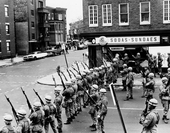 National Guardsmen seal off a business-residential section of Baltimore and prepare to use tear gas against looters on April 8, 1968.