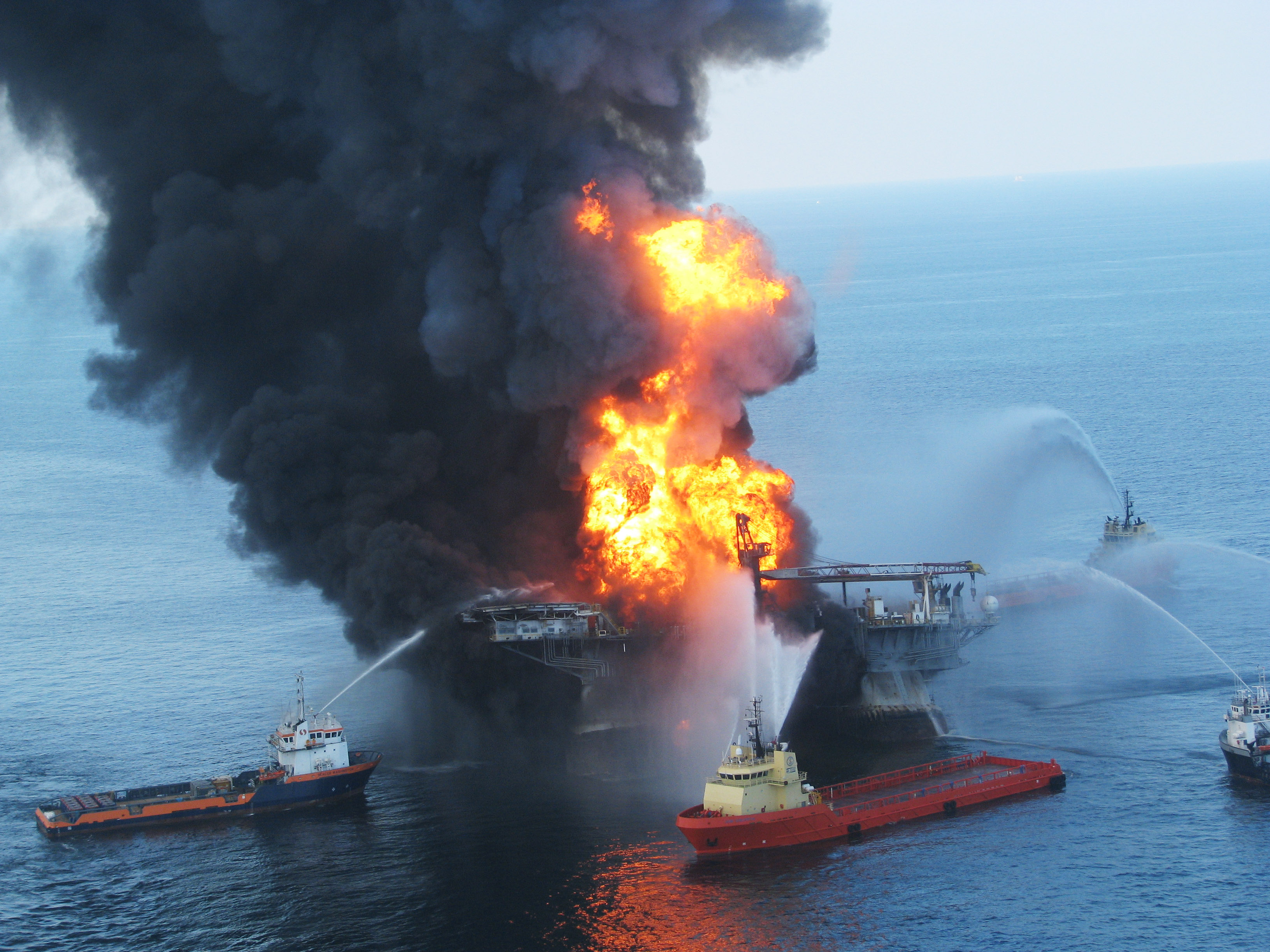 Fire boats battle a fire at the off shore oil rig Deepwater Horizon. (U.S. Coast Guard)